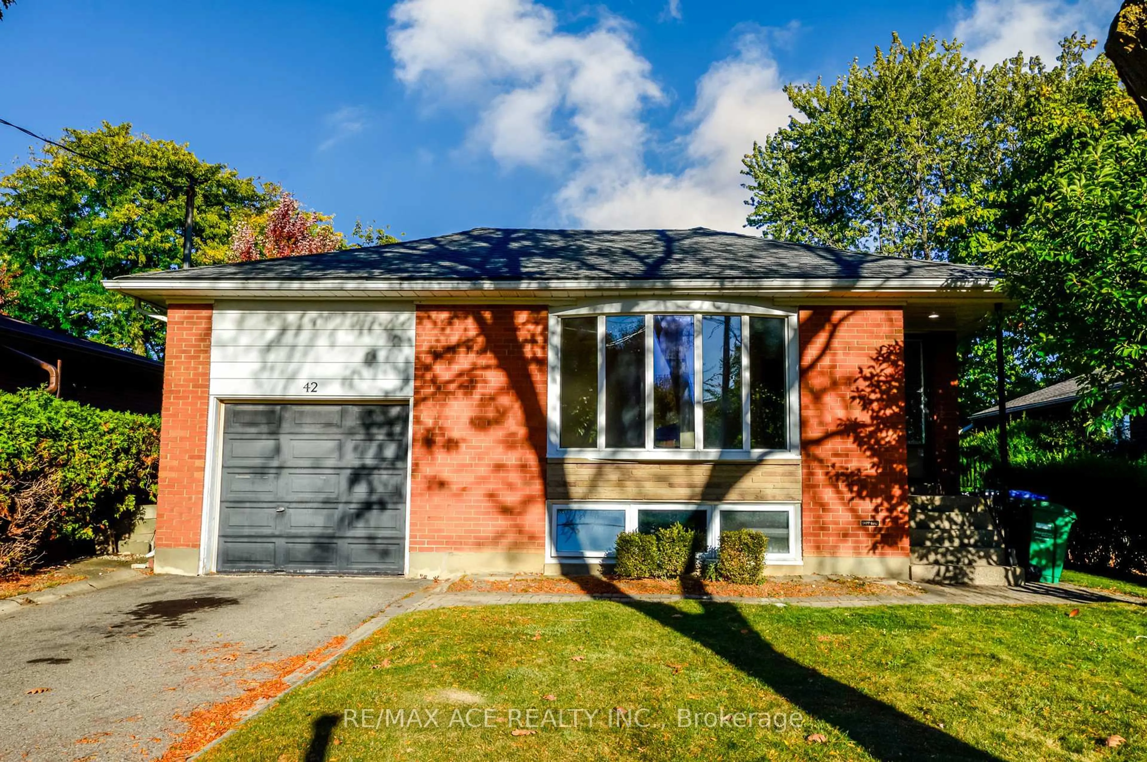 Home with brick exterior material, street for 42 Swanhurst Blvd, Mississauga Ontario L5N 1B7