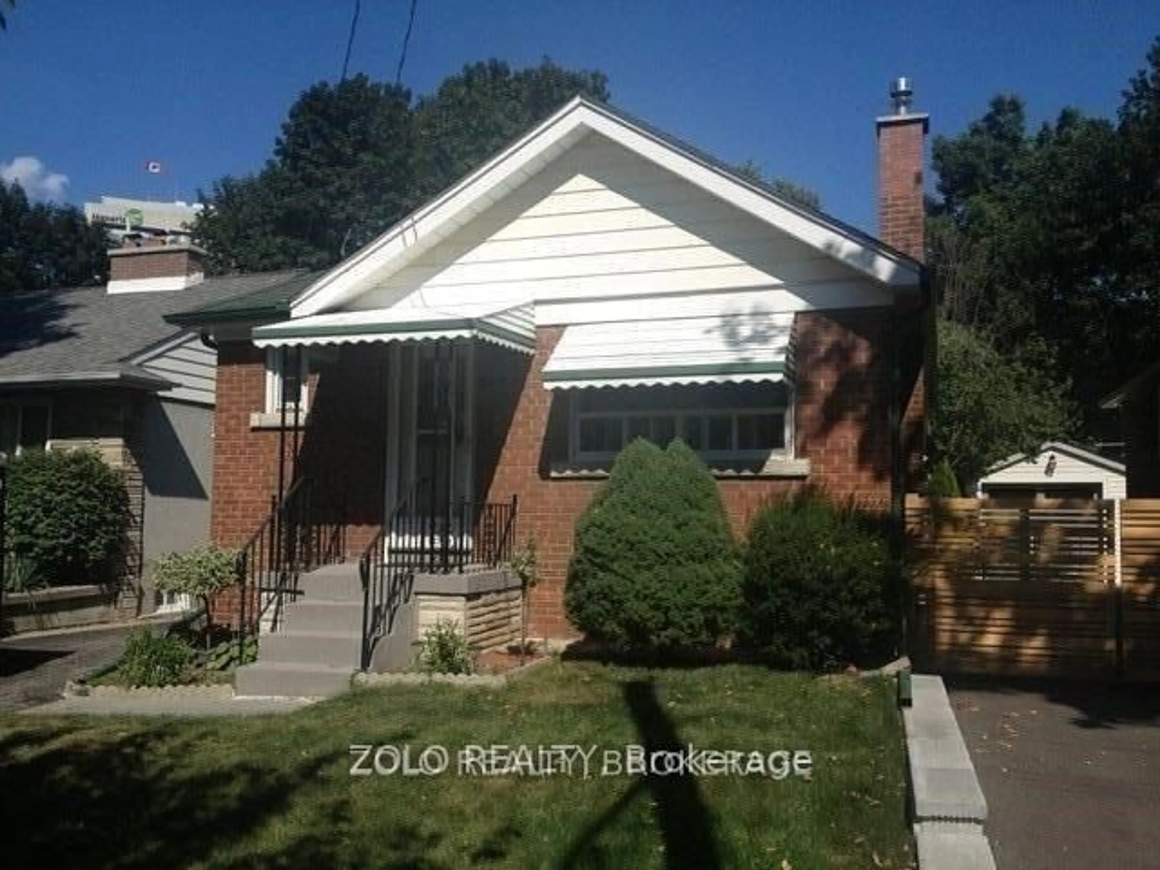 Home with brick exterior material, street for 23 Green Lanes, Toronto Ontario M8Z 4V5