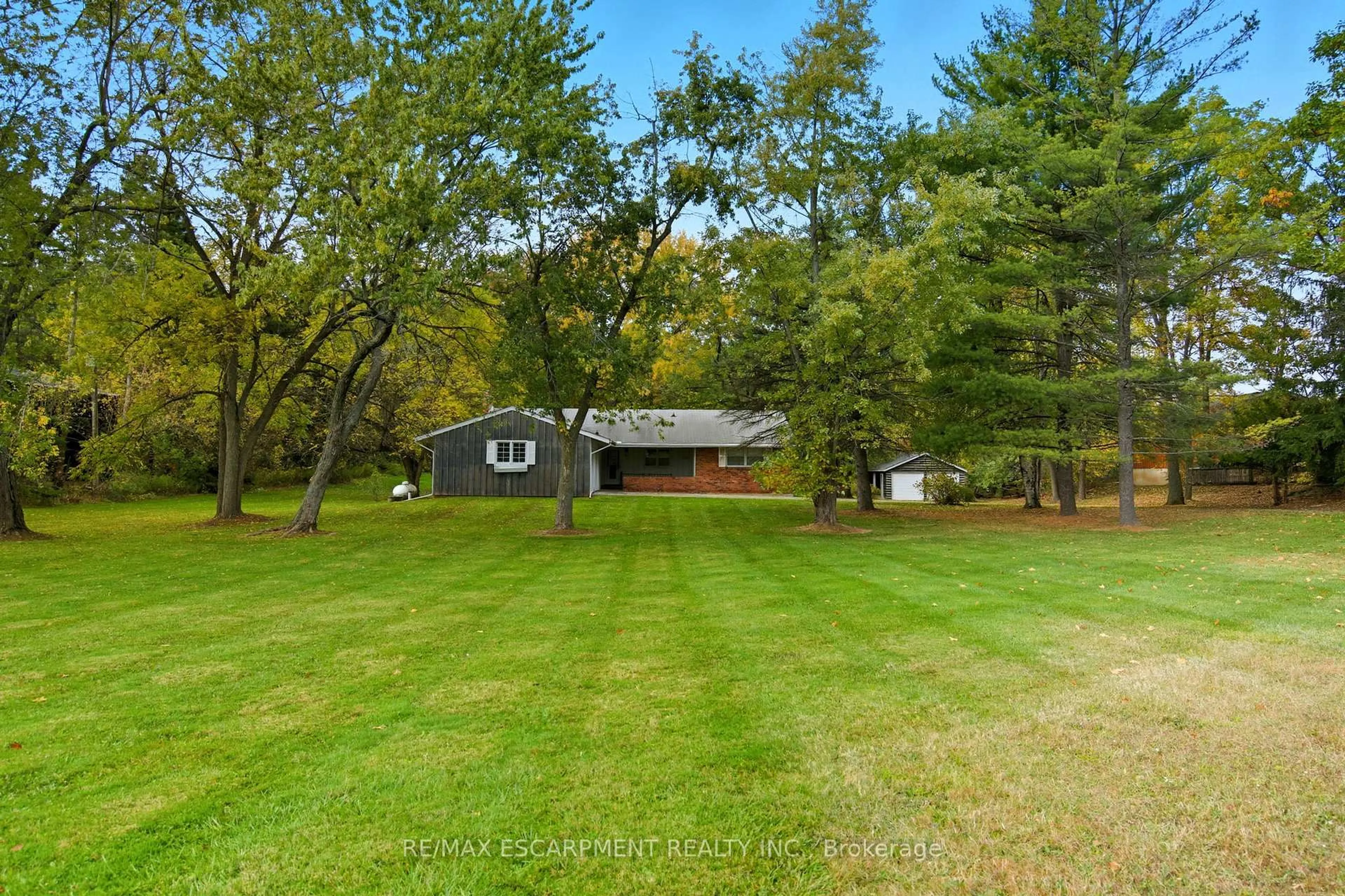 A pic from outside/outdoor area/front of a property/back of a property/a pic from drone, water/lake/river/ocean view for 2179 Britannia Rd, Burlington Ontario L7P 0E8