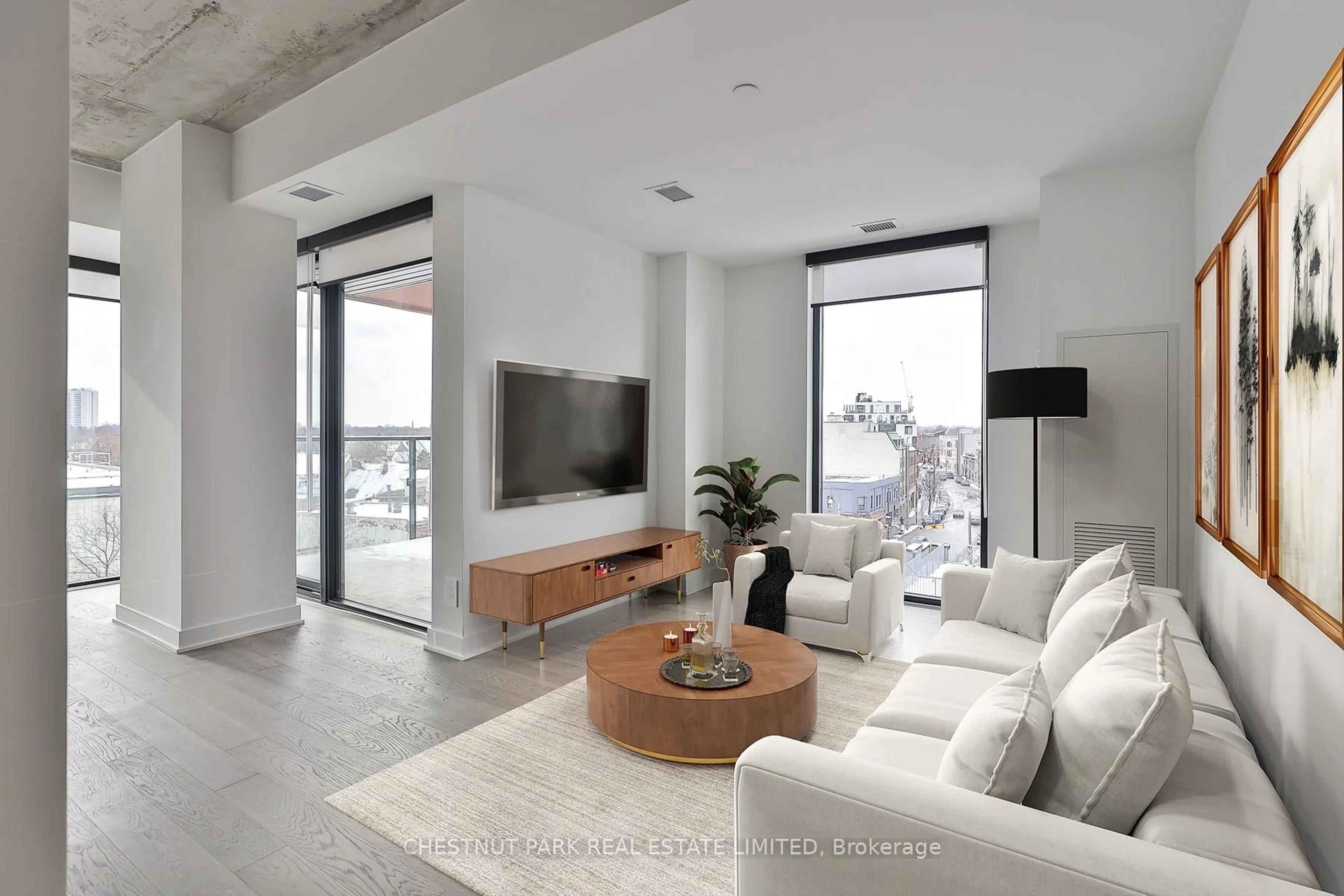 Living room with furniture, cement floor for 2720 Dundas St #508, Toronto Ontario M6P 1Y2