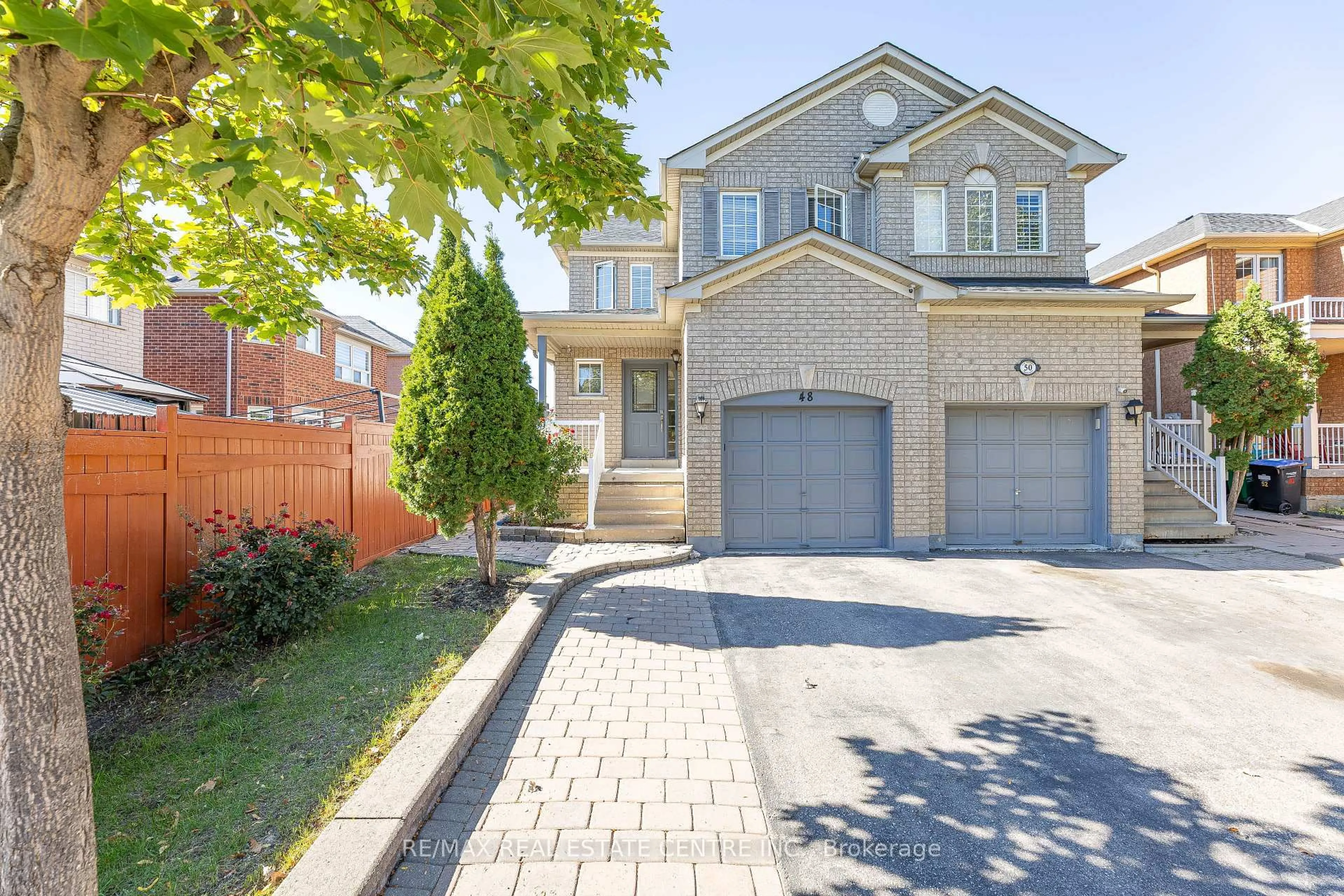 Home with brick exterior material, street for 48 Zia Dodda Cres, Brampton Ontario L6P 1J5
