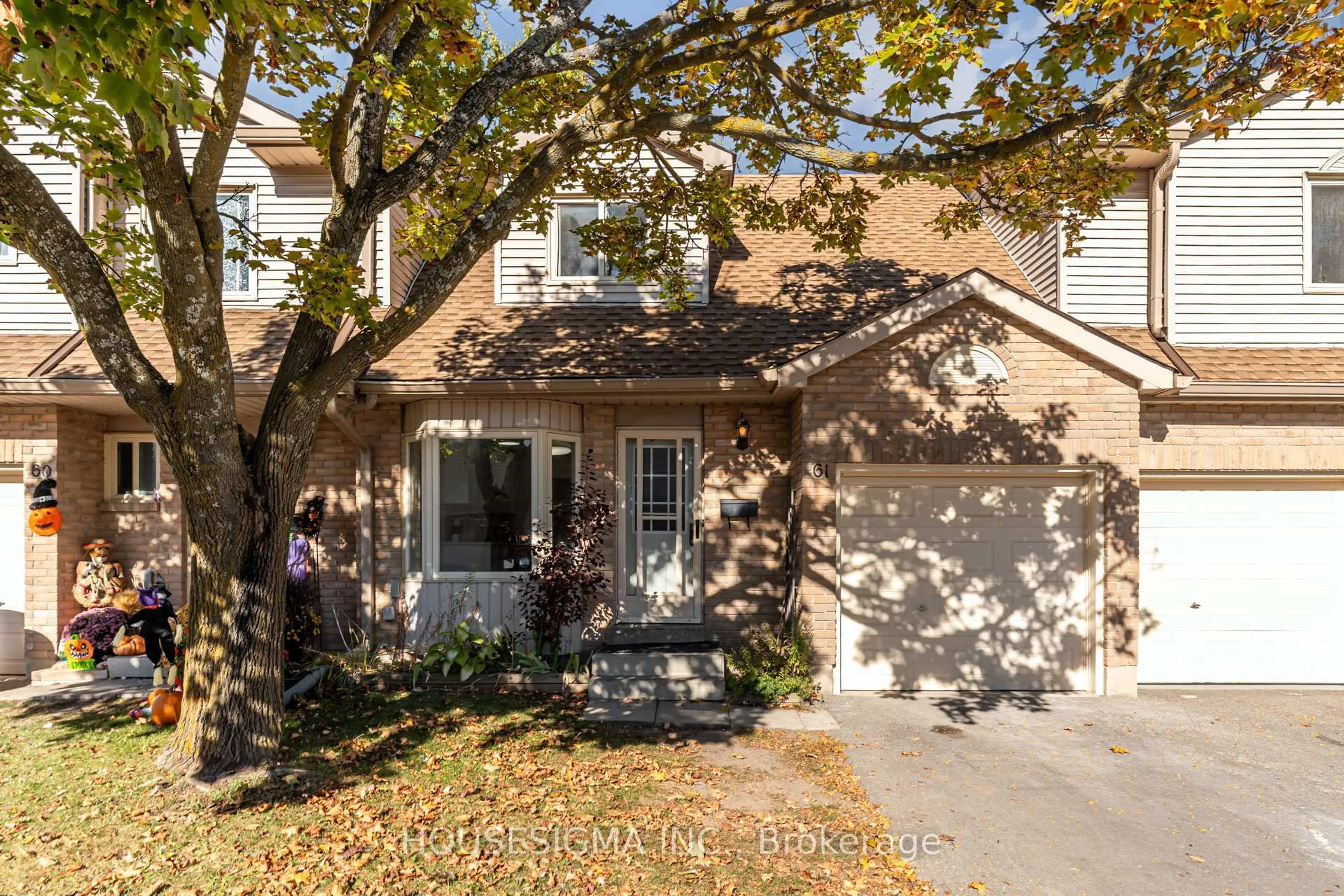 Home with brick exterior material, street for 31 Parkview Dr #61, Orangeville Ontario L9W 4J1