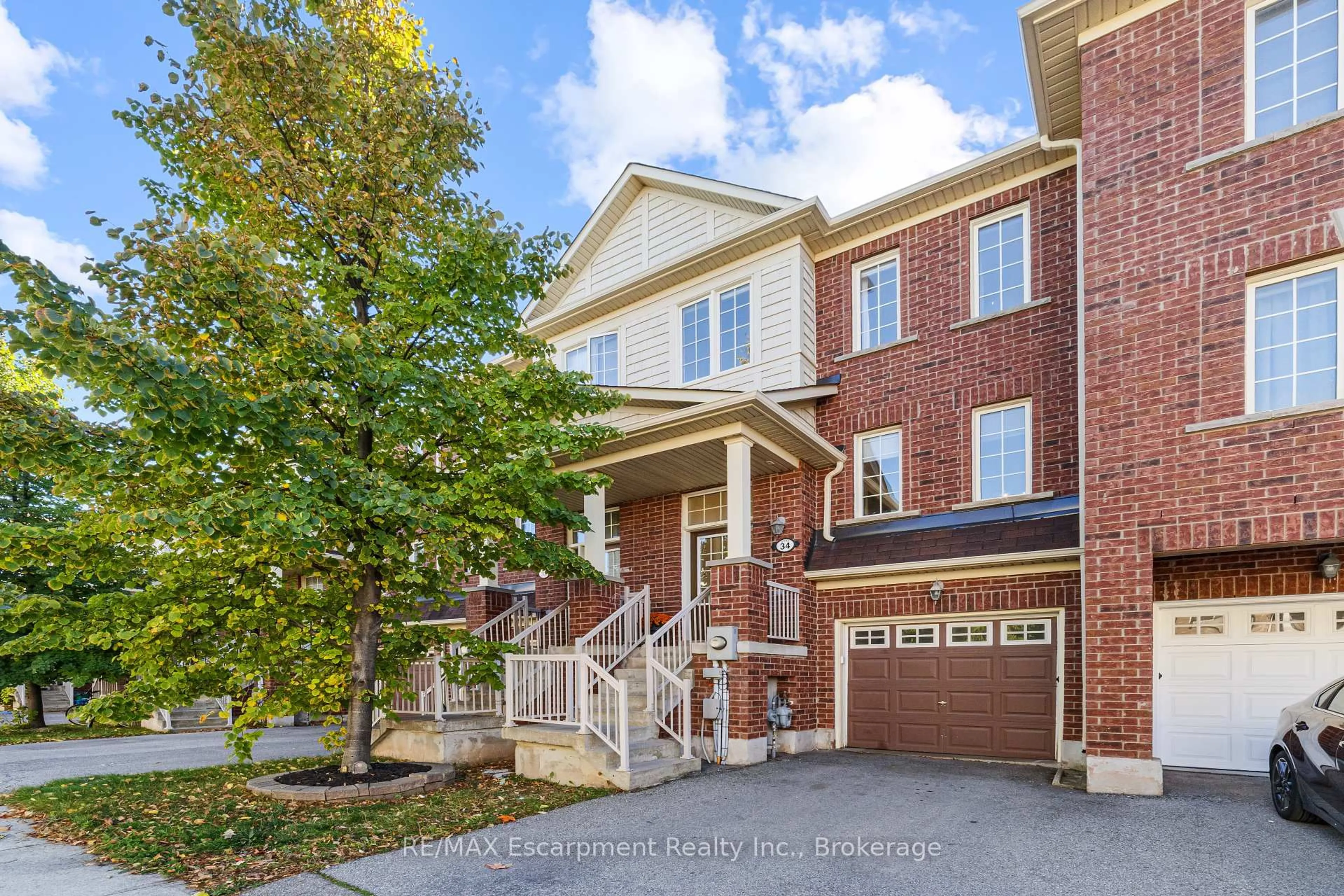 Home with brick exterior material, street for 2186 Fiddlers Way #34, Oakville Ontario L6M 0L5