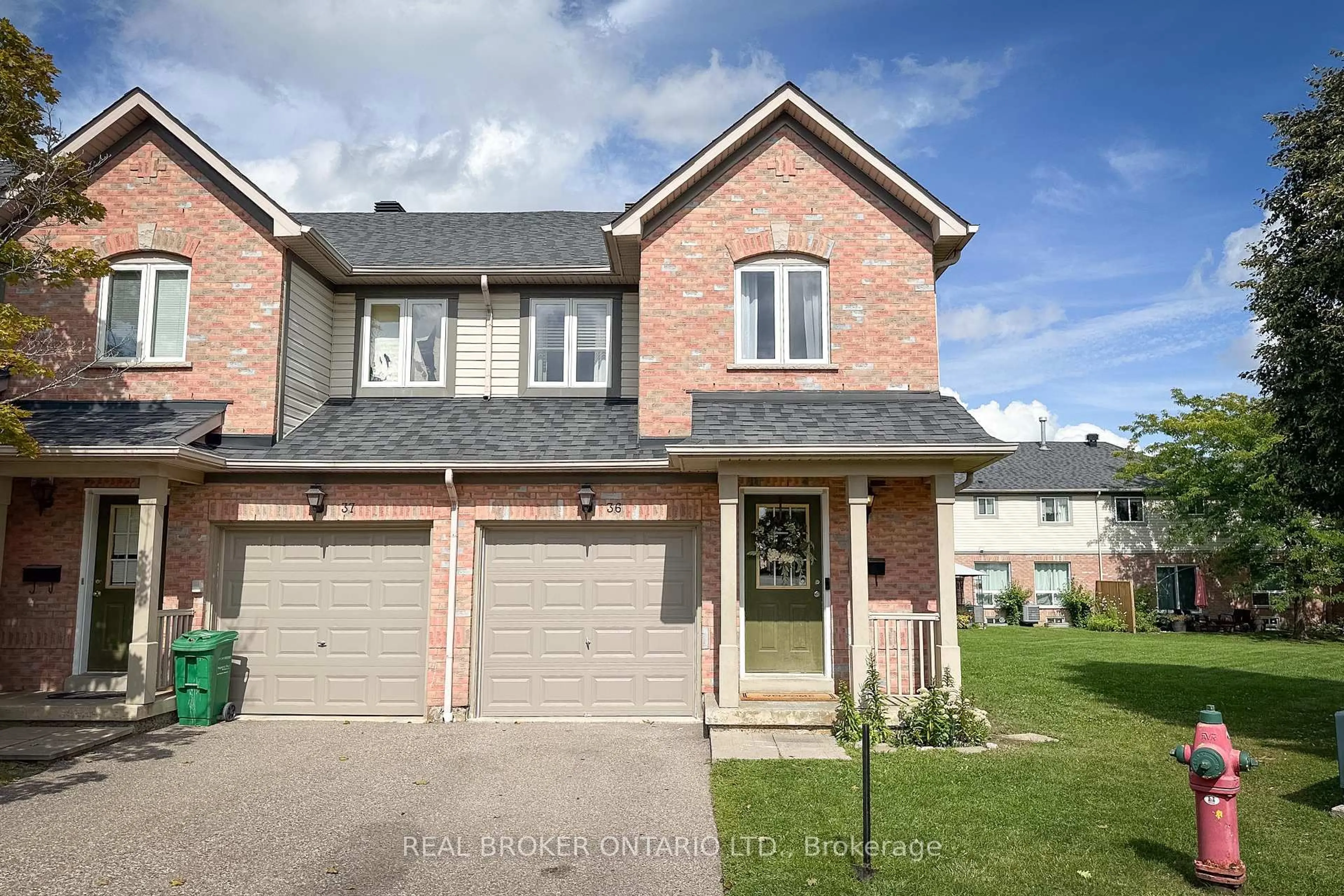 Home with brick exterior material, street for 5255 Guildwood Way #36, Mississauga Ontario L5R 4A7