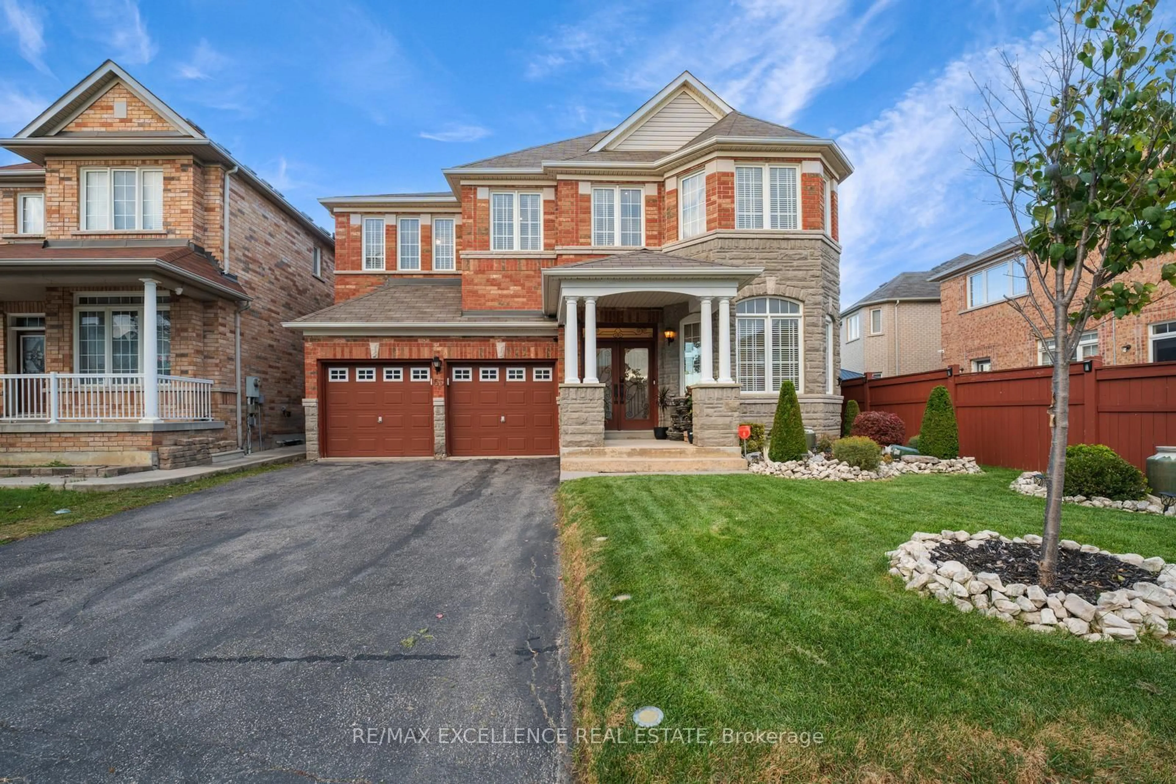 Home with brick exterior material, street for 63 Powell Dr, Brampton Ontario L6R 0K8