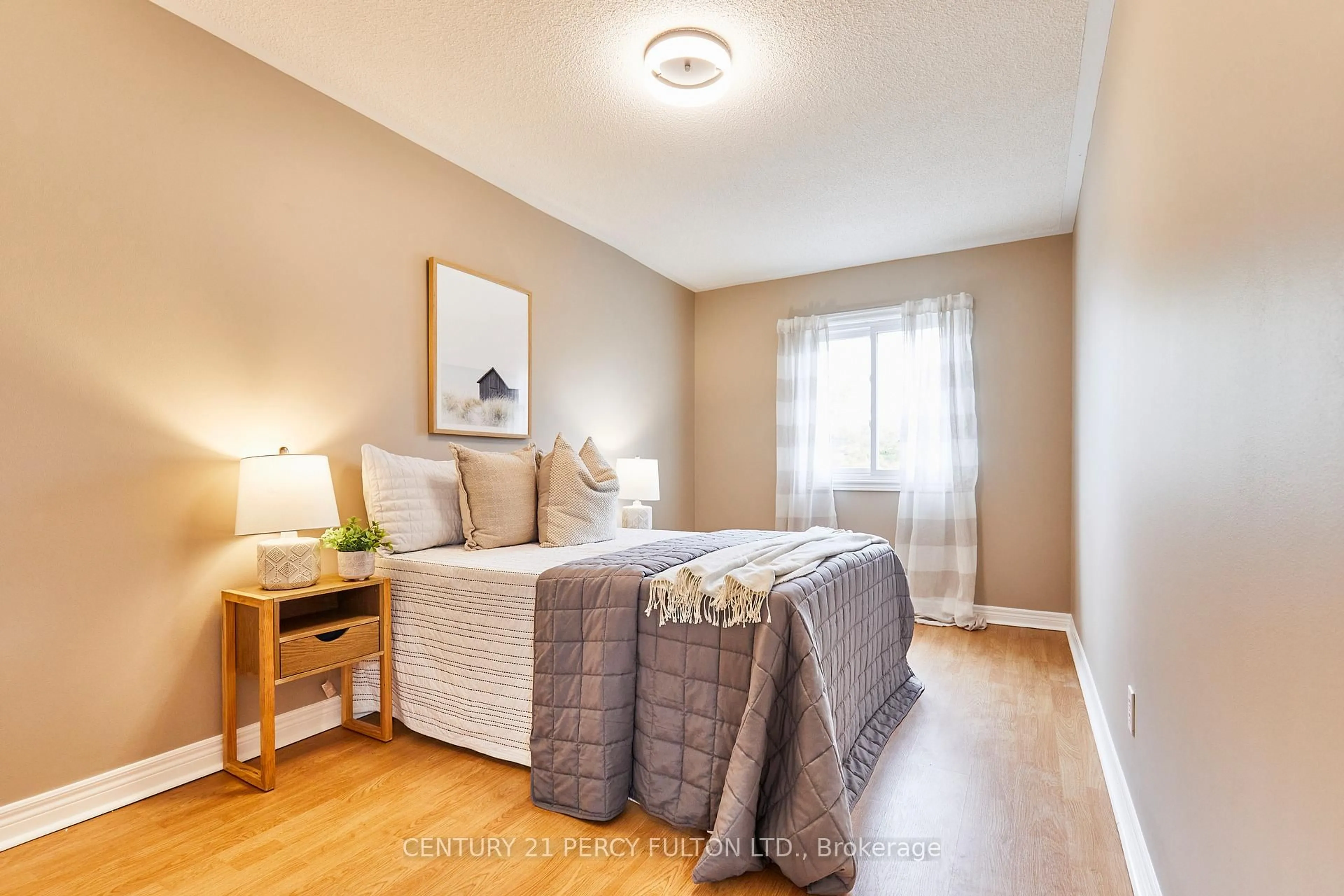 Bedroom with bed, wood/laminate floor for 29 Archbury Circ, Caledon Ontario L7E 2H7