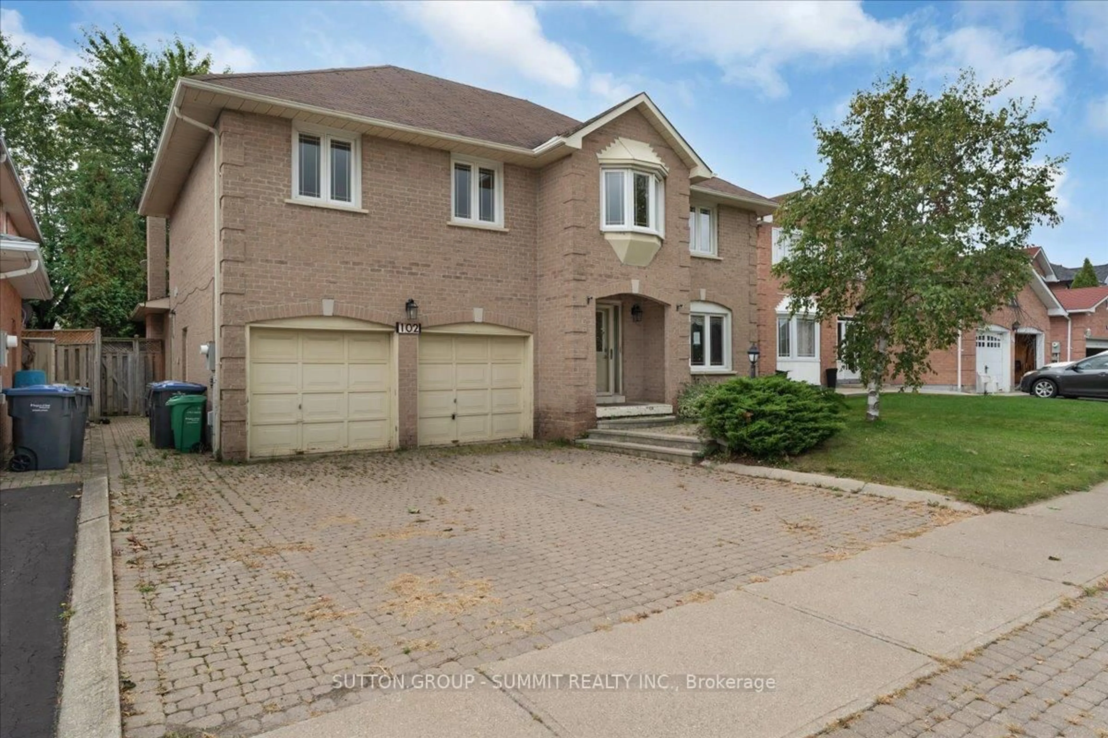 Home with brick exterior material, street for 102 Sunforest Dr, Brampton Ontario L6Z 4B2