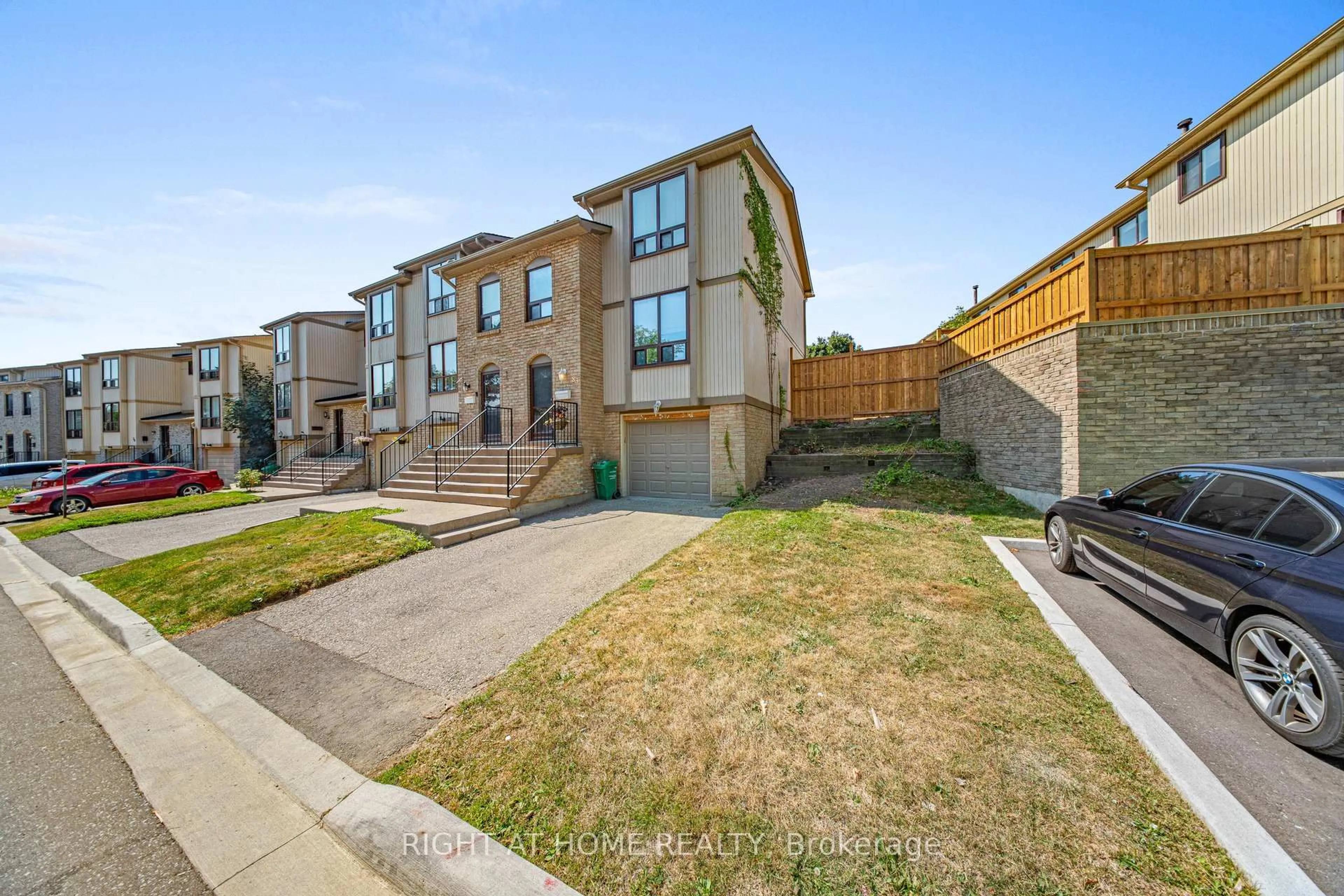 A pic from outside/outdoor area/front of a property/back of a property/a pic from drone, street for 83 Guildford Cres #83, Brampton Ontario L6S 3K2