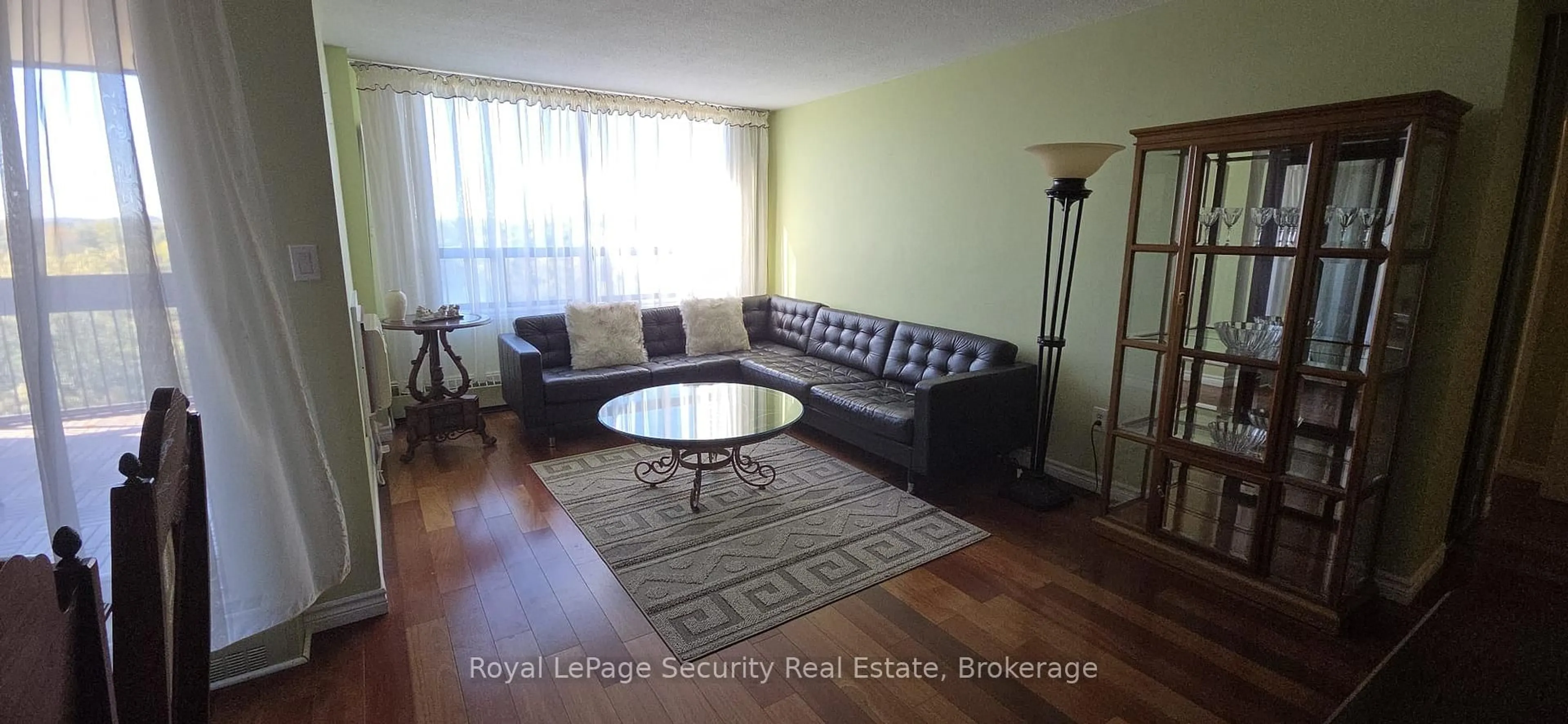 Living room with furniture, wood/laminate floor for 2556 Argyle Rd #805, Mississauga Ontario L5B 2H6
