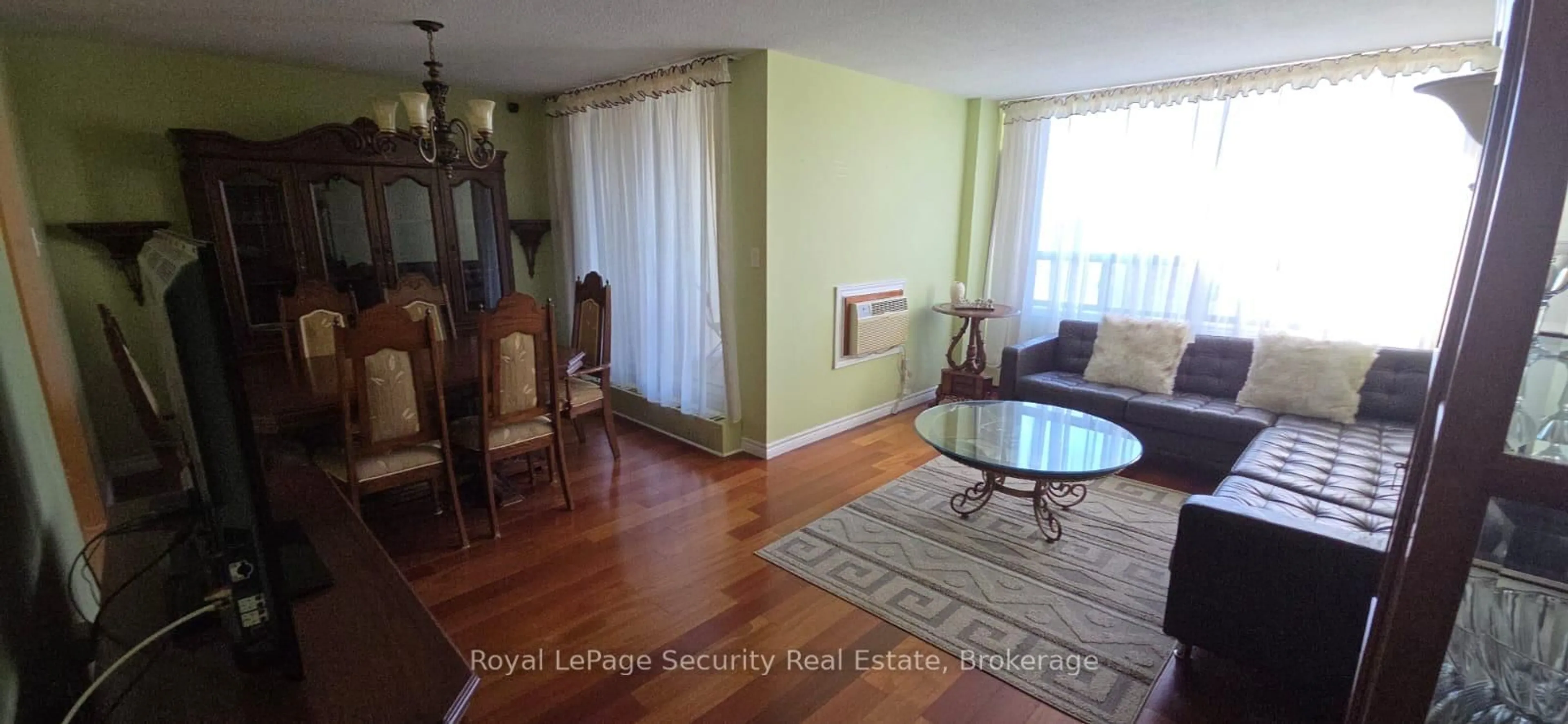 Living room with furniture, wood/laminate floor for 2556 Argyle Rd #805, Mississauga Ontario L5B 2H6
