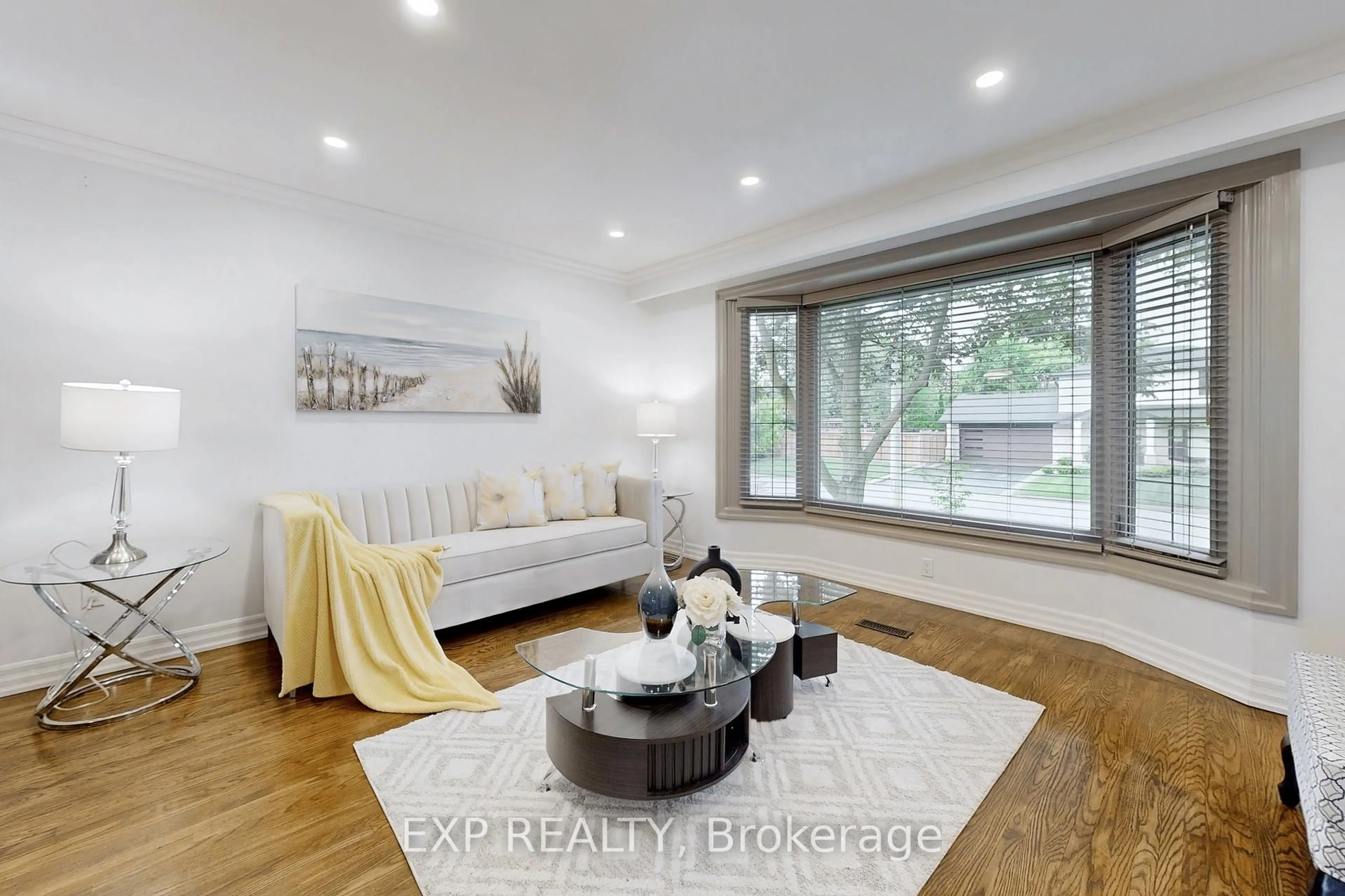 Living room with furniture, wood/laminate floor for 5 Lockton Cres, Brampton Ontario L6W 1C2