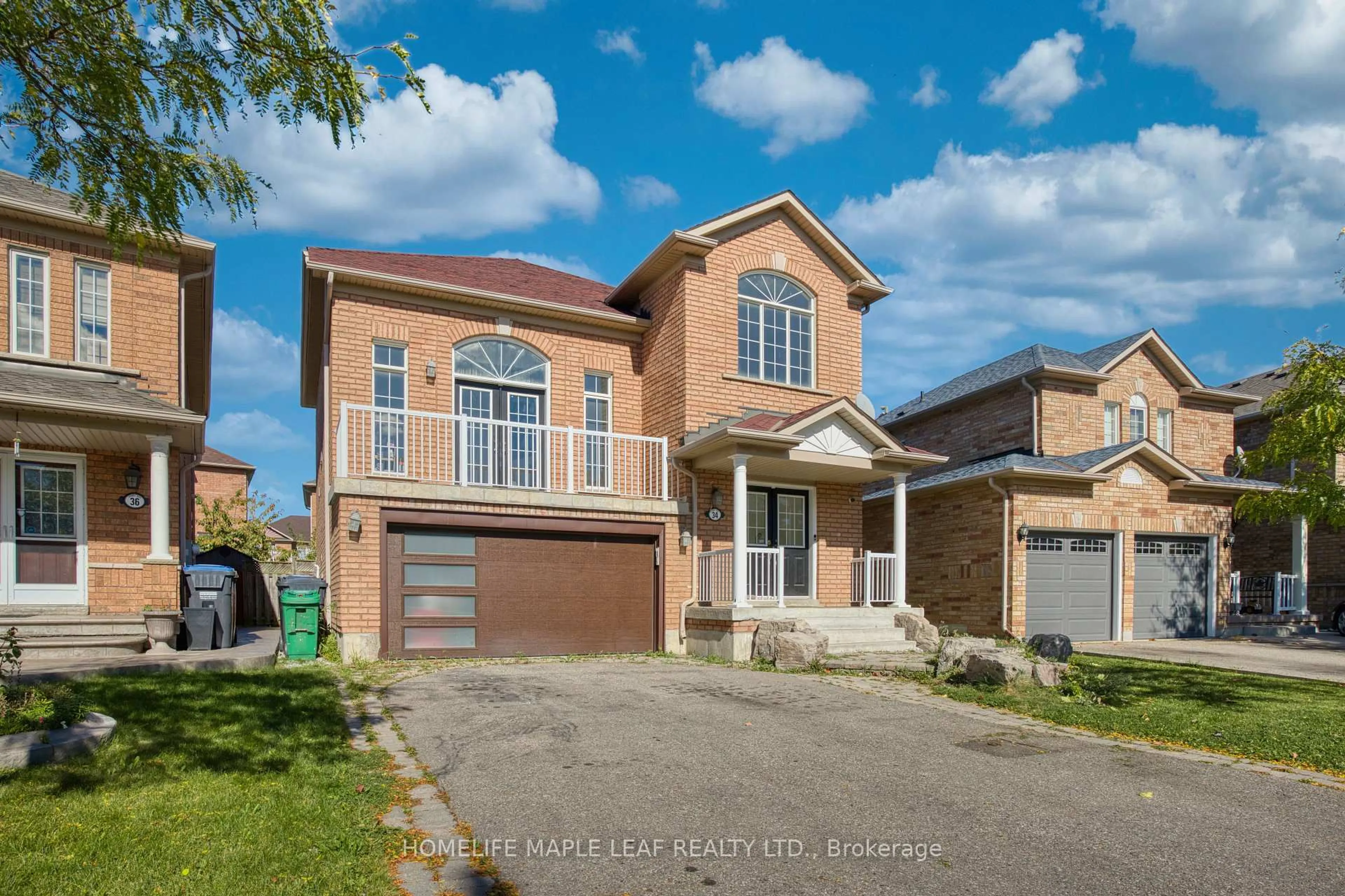 Home with brick exterior material, street for 34 Lormel Gate, Brampton Ontario L7A 2K5