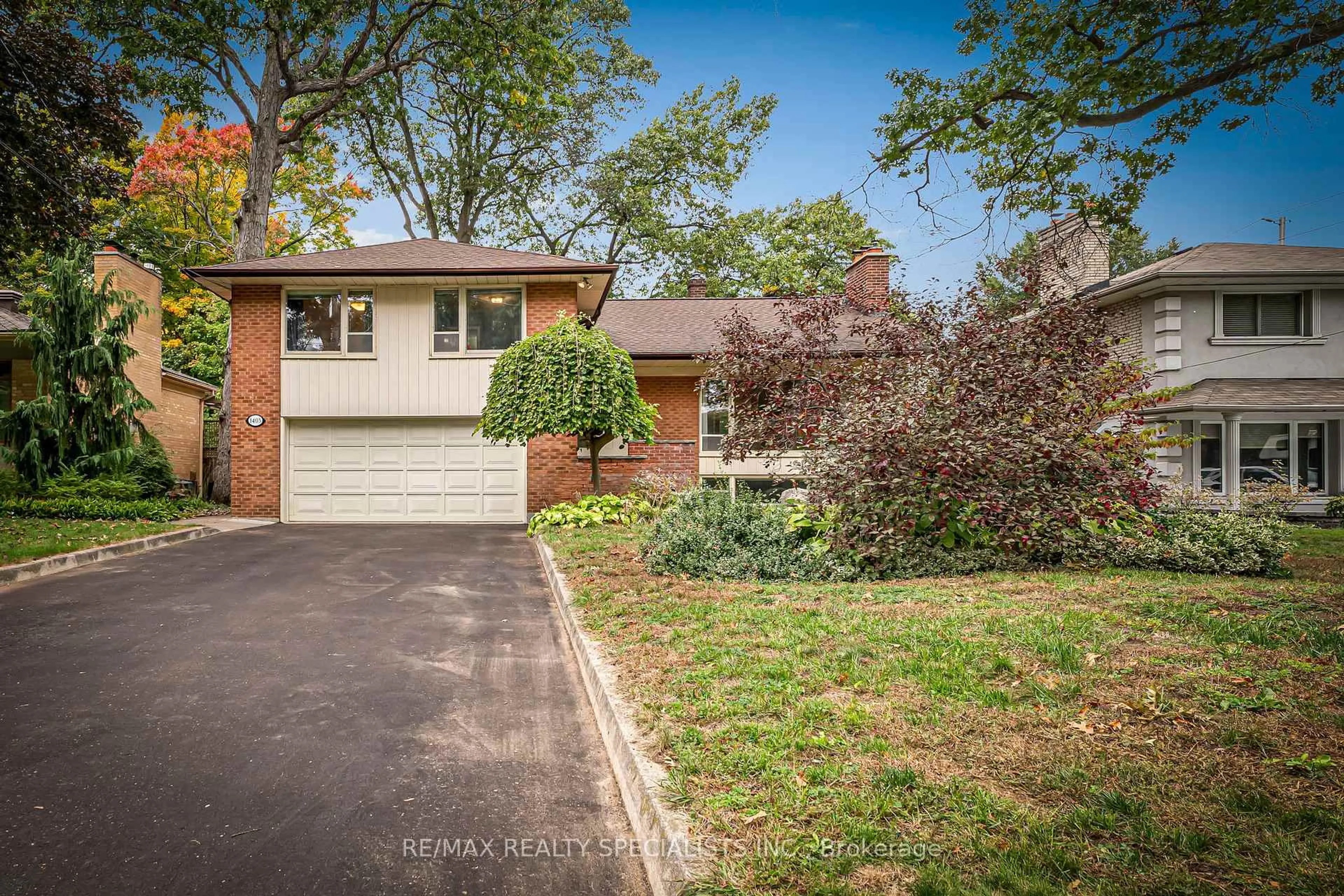 Home with brick exterior material, street for 1403 Ballyclare Dr, Mississauga Ontario L5C 1J4