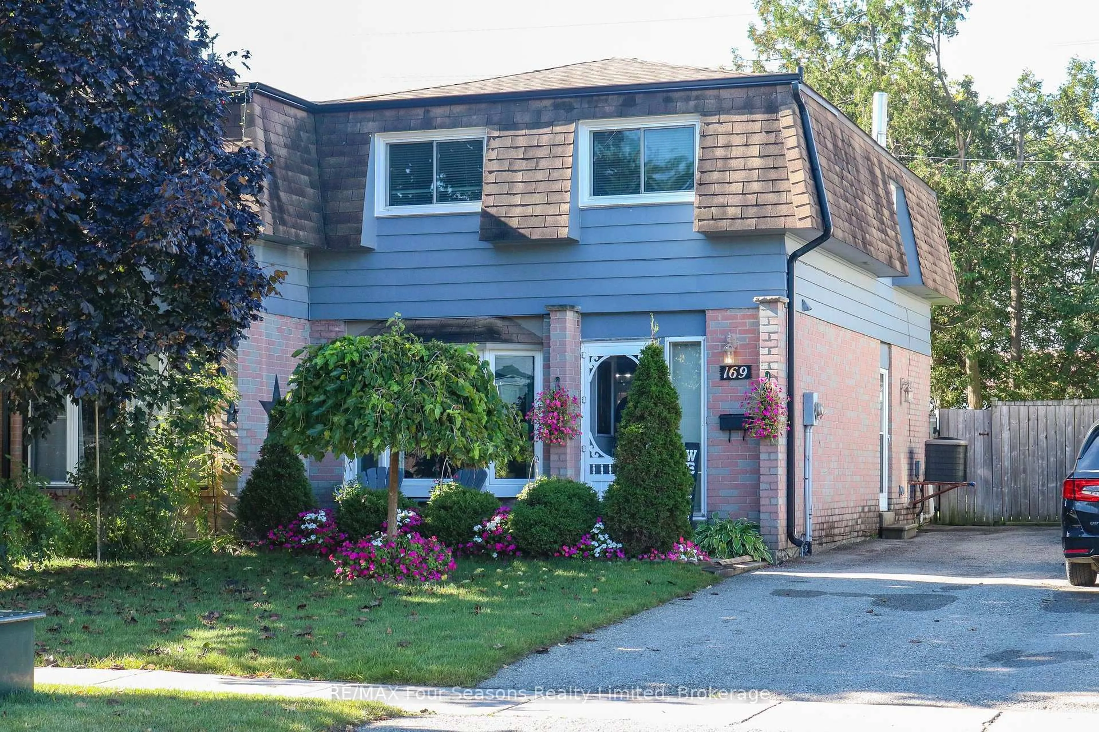 Home with vinyl exterior material, street for 169 Burbank Cres, Orangeville Ontario L9W 3H7