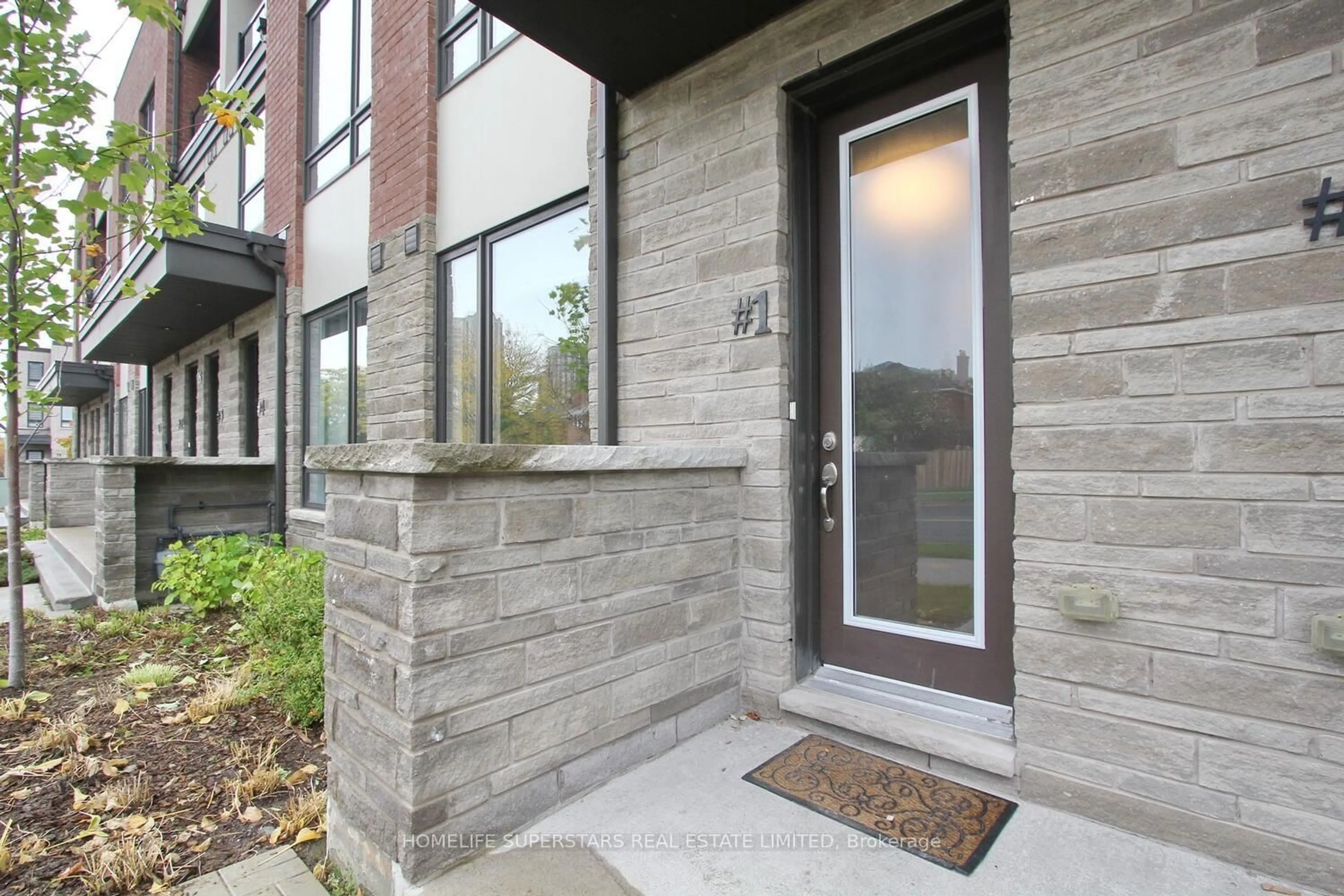 Home with brick exterior material, street for 24 Humberwood Blvd #1, Toronto Ontario M9W 0G1