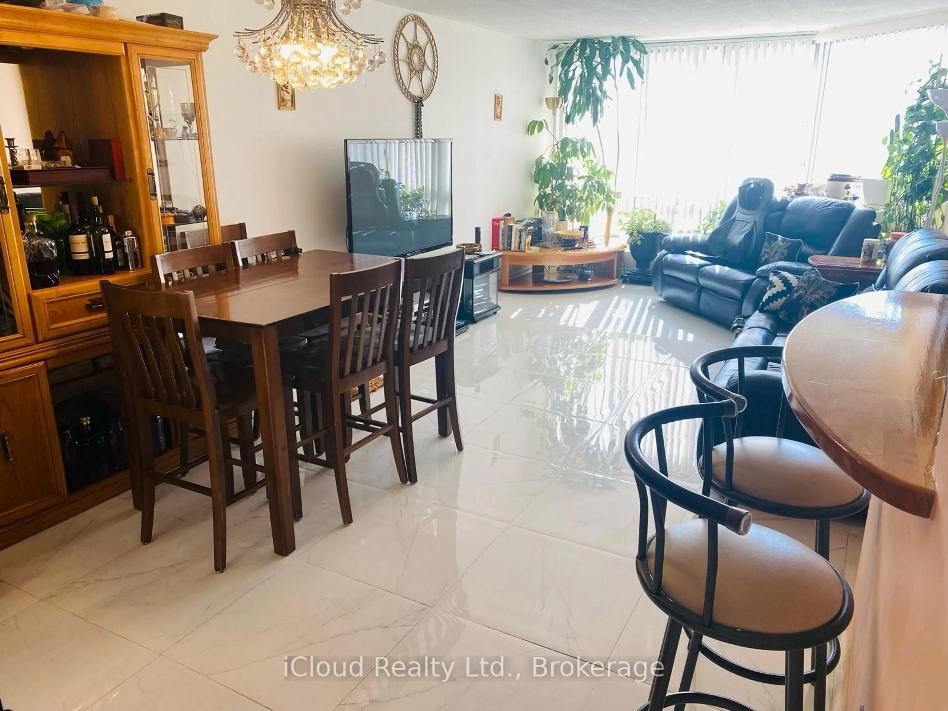Living room with furniture, unknown for 25 Fairview Rd #1004, Mississauga Ontario L5B 3Y8