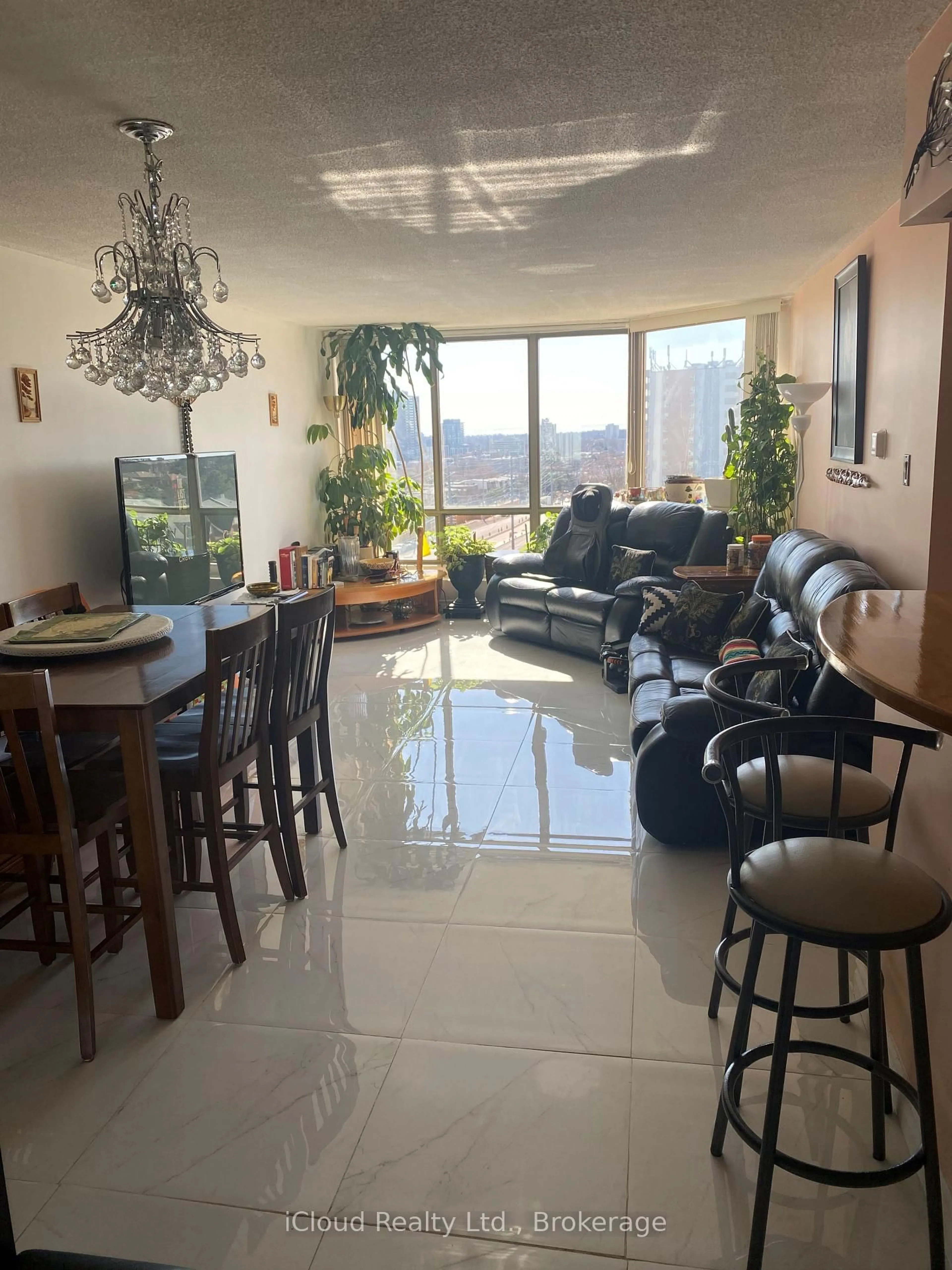 Living room with furniture, unknown for 25 Fairview Rd #1004, Mississauga Ontario L5B 3Y8
