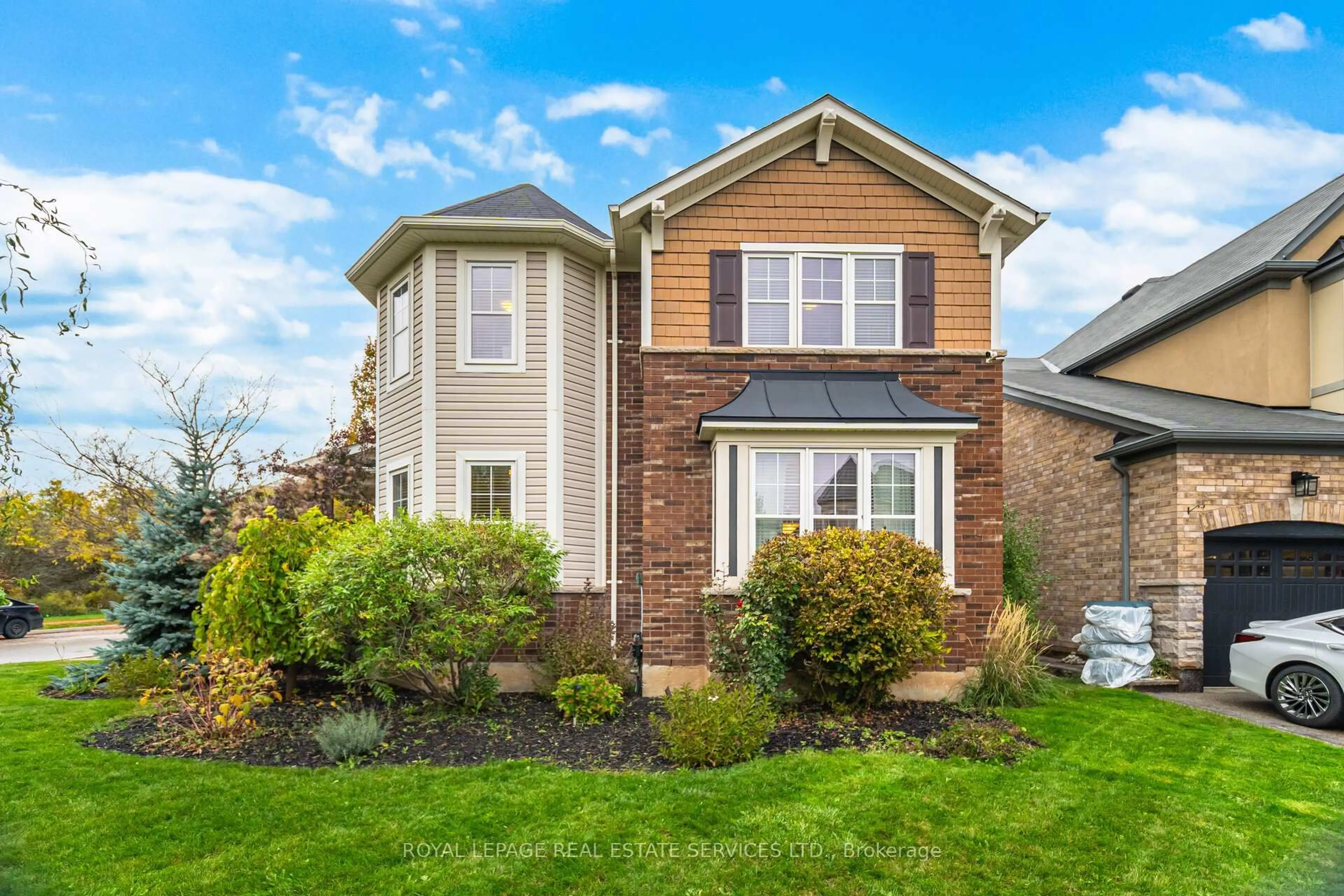 Home with brick exterior material, street for 444 Coombs Crt, Milton Ontario L9T 7N5