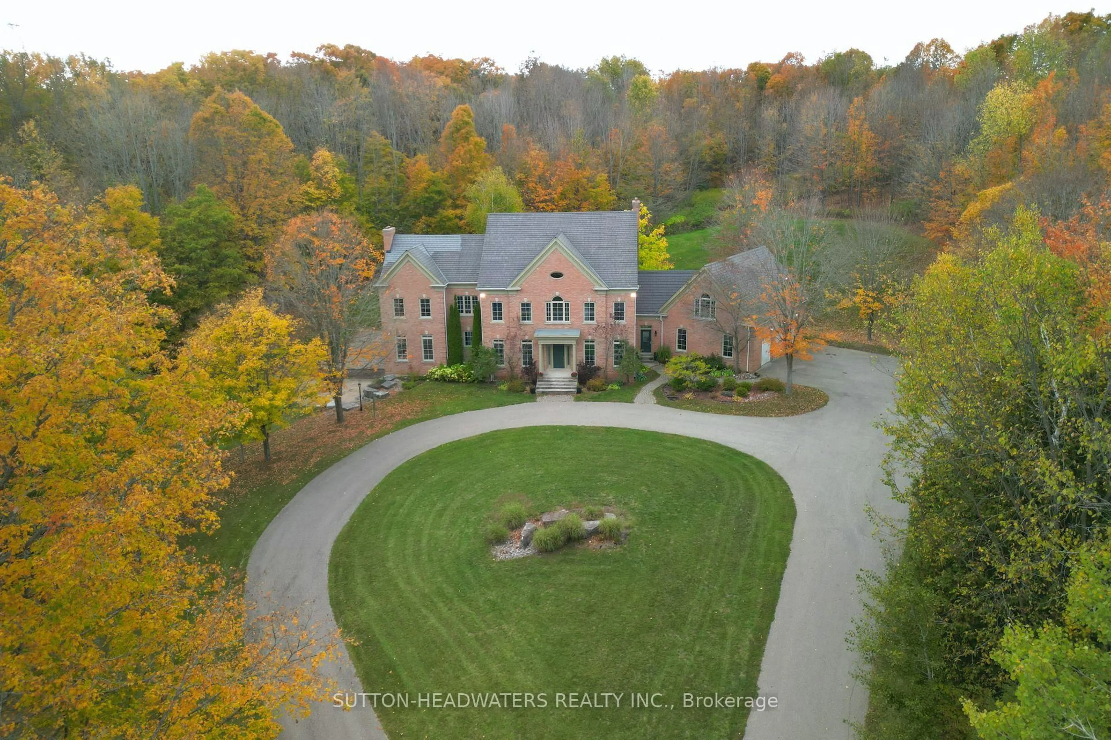 A pic from outside/outdoor area/front of a property/back of a property/a pic from drone, unknown for 12 Flaherty Lane, Caledon Ontario L7K 2P3