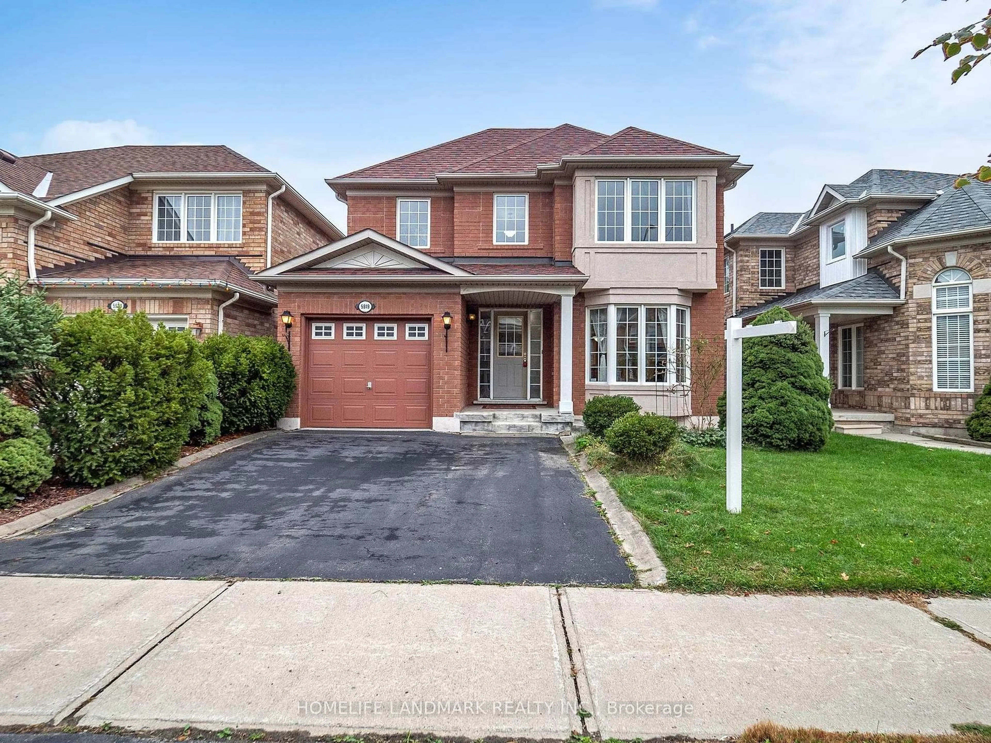 Home with brick exterior material, street for 5919 Osprey Blvd, Mississauga Ontario L5N 8J7