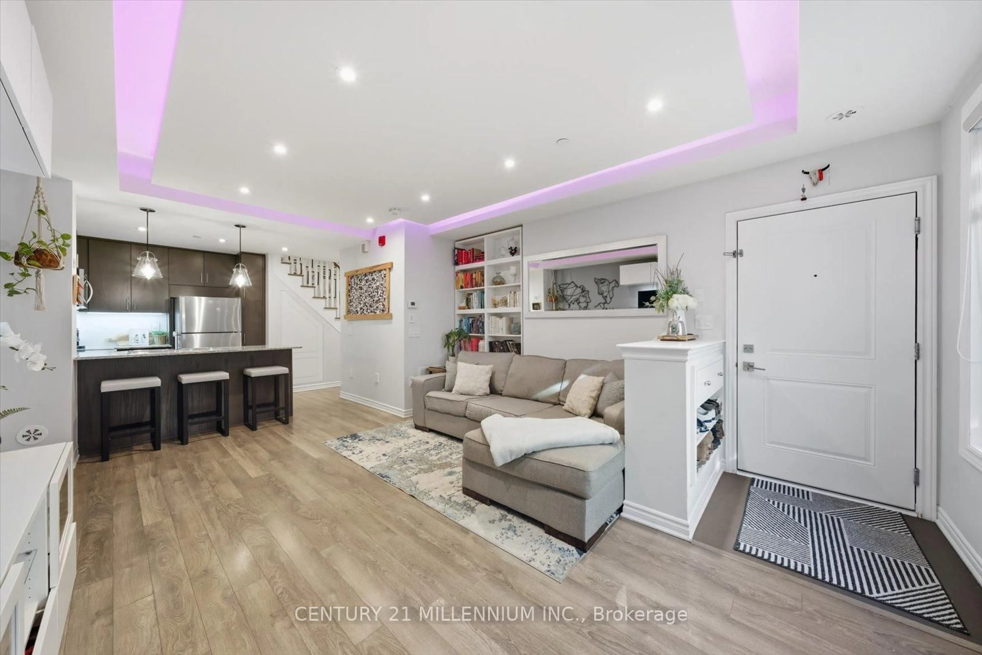 Living room with furniture, wood/laminate floor for 95 Eastwood Park Gdns #21, Toronto Ontario M8W 0B9