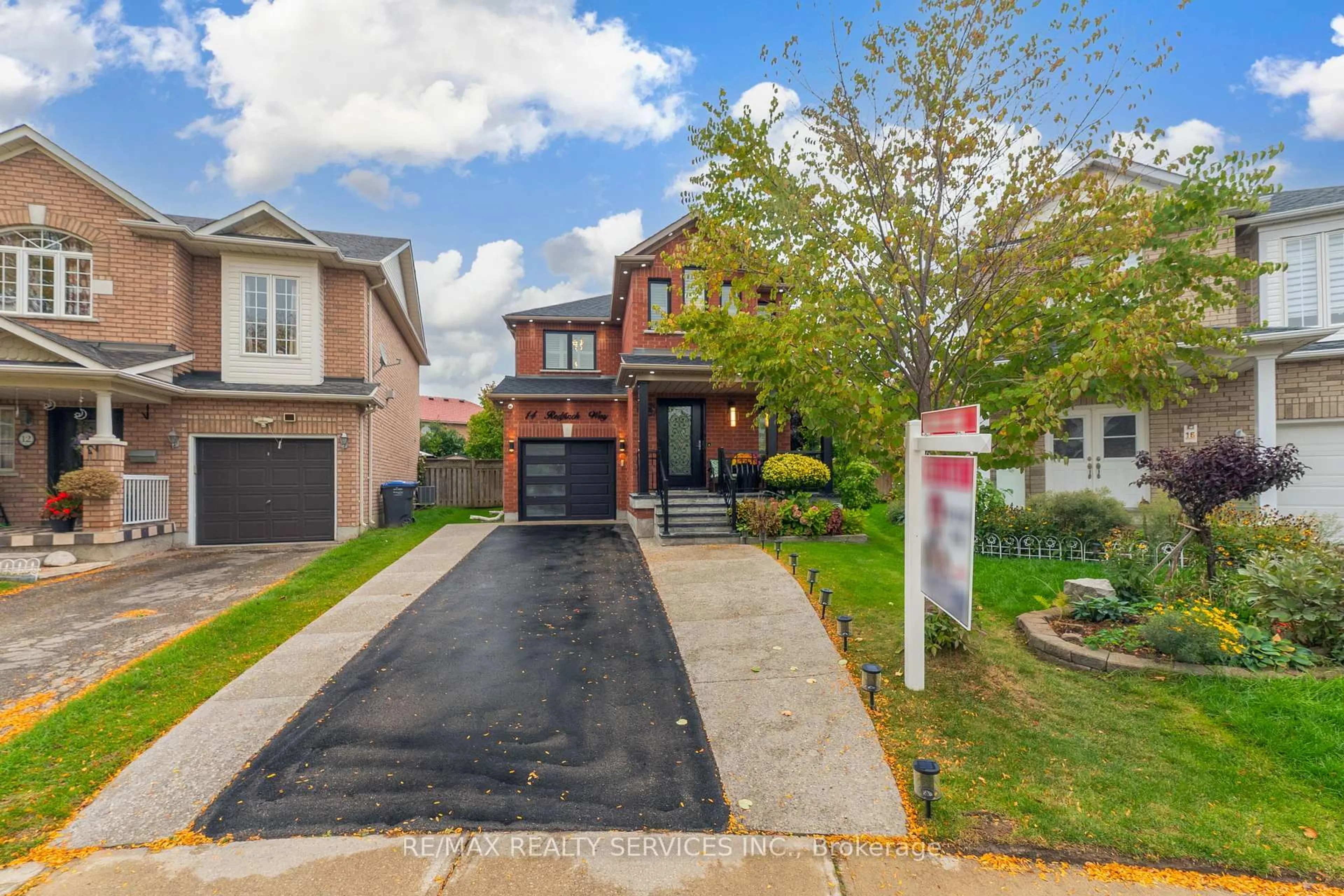 Home with brick exterior material, street for 14 Redfinch Way, Brampton Ontario L7A 2B3