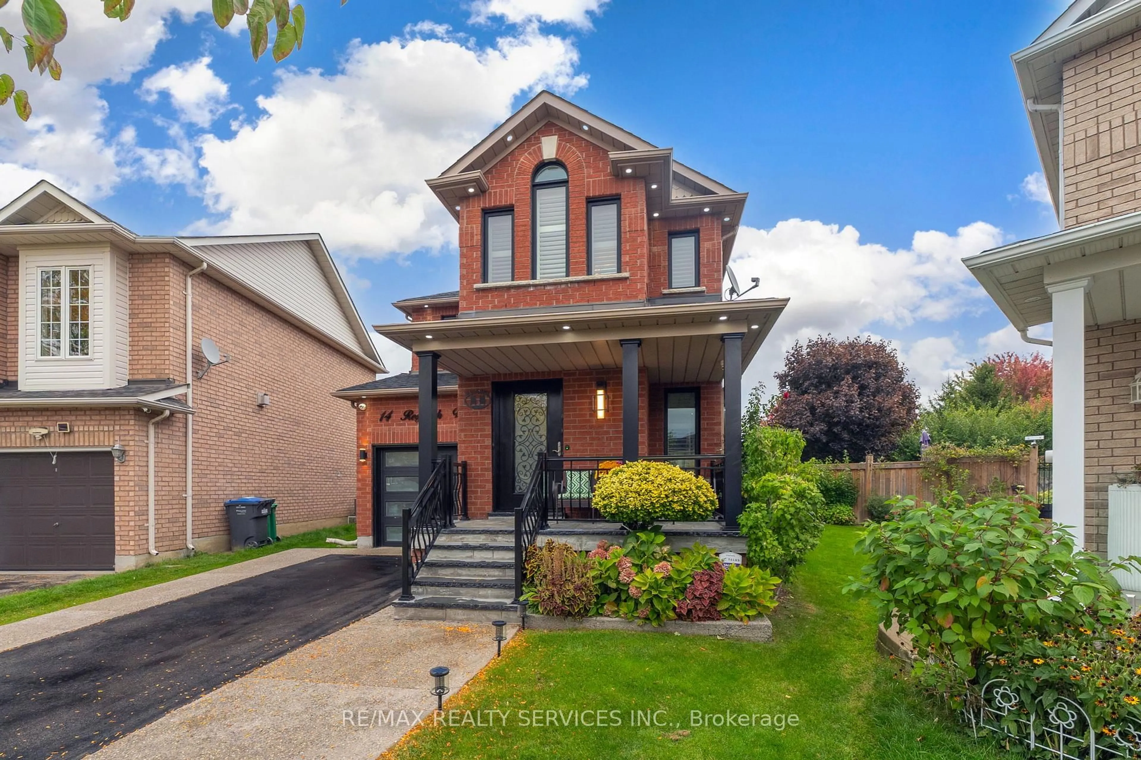 Home with brick exterior material, street for 14 Redfinch Way, Brampton Ontario L7A 2B3