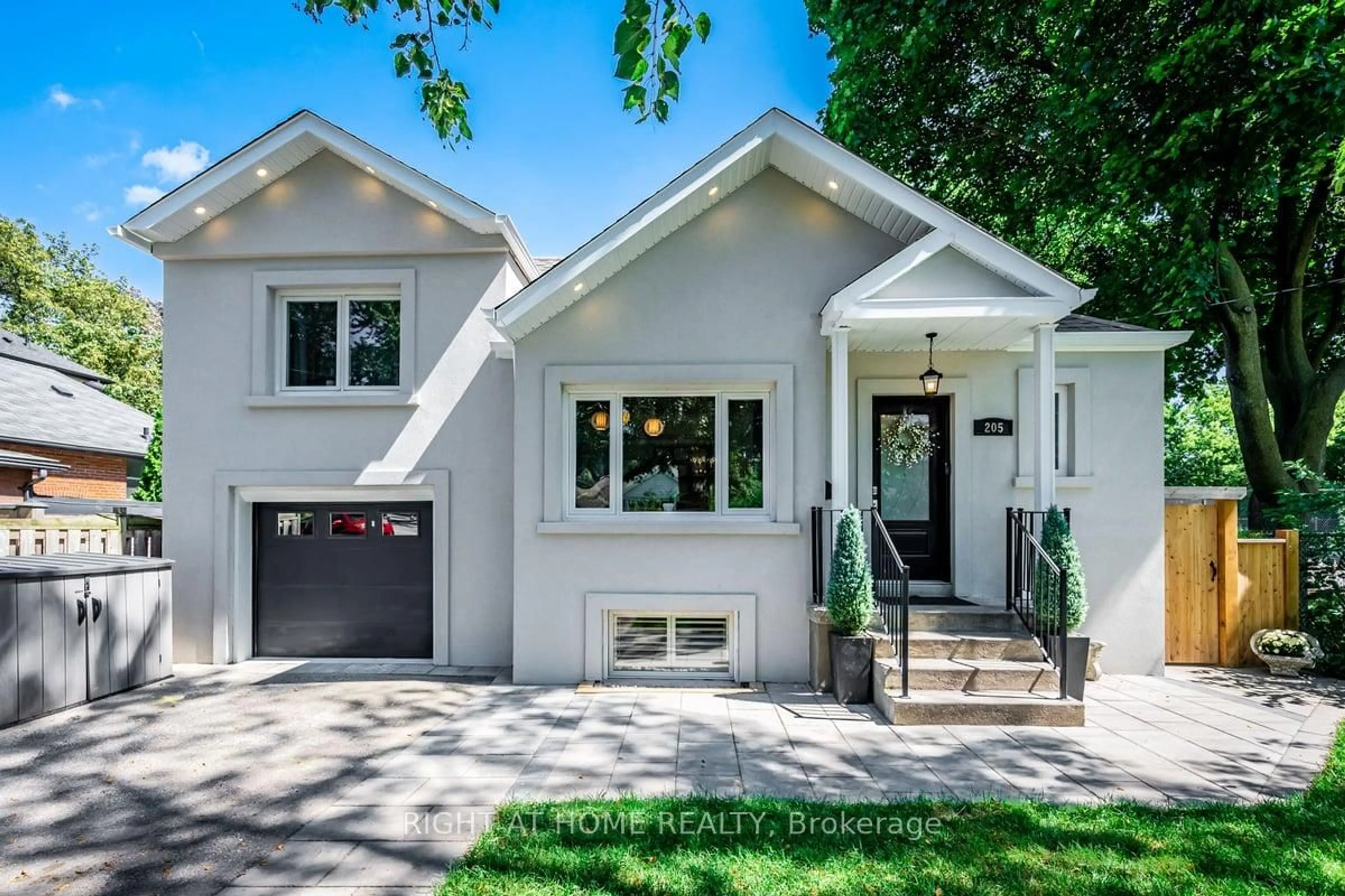 Home with vinyl exterior material, street for 205 Prince Edward Dr, Toronto Ontario M8Y 3X1