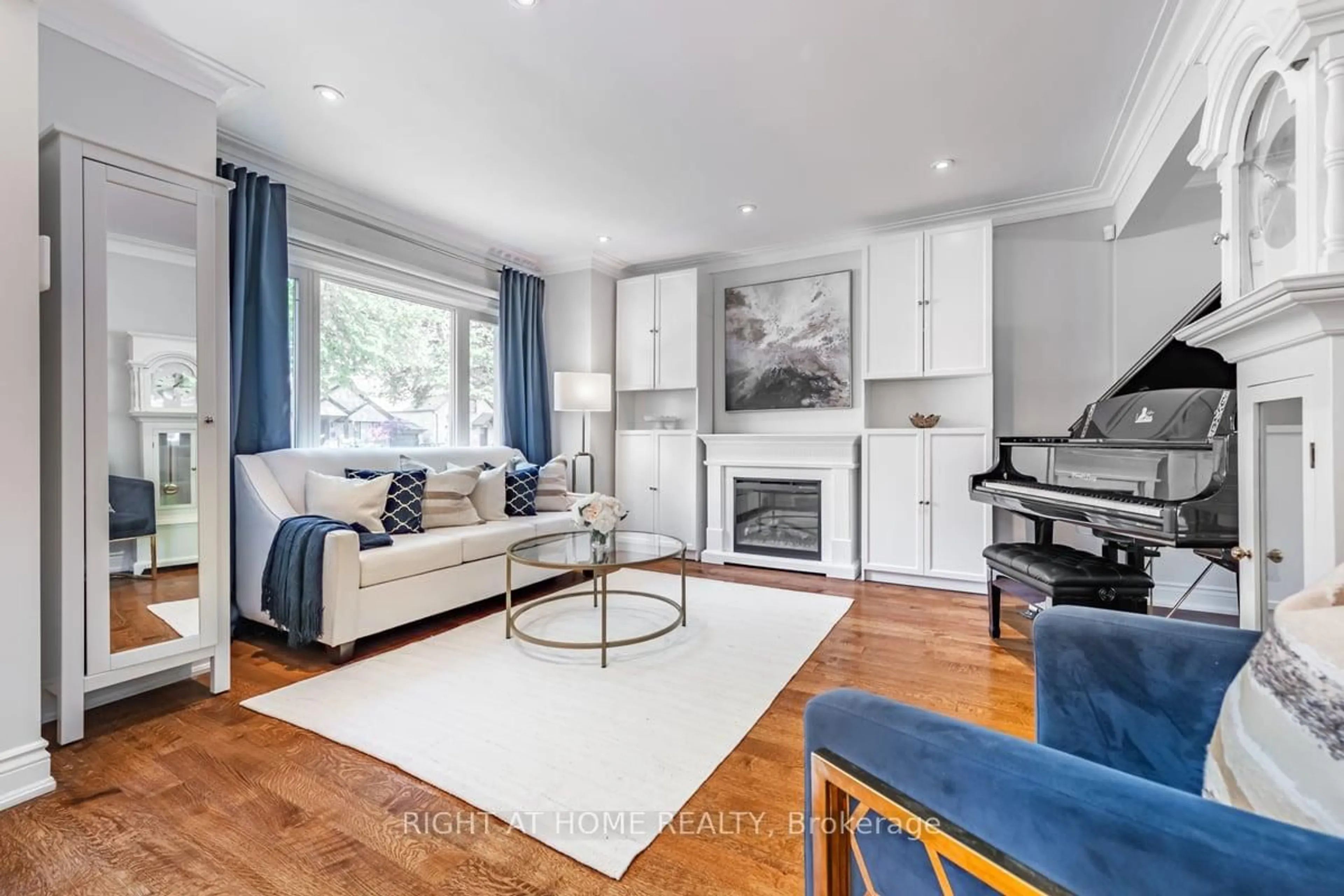 Living room with furniture, wood/laminate floor for 205 Prince Edward Dr, Toronto Ontario M8Y 3X1