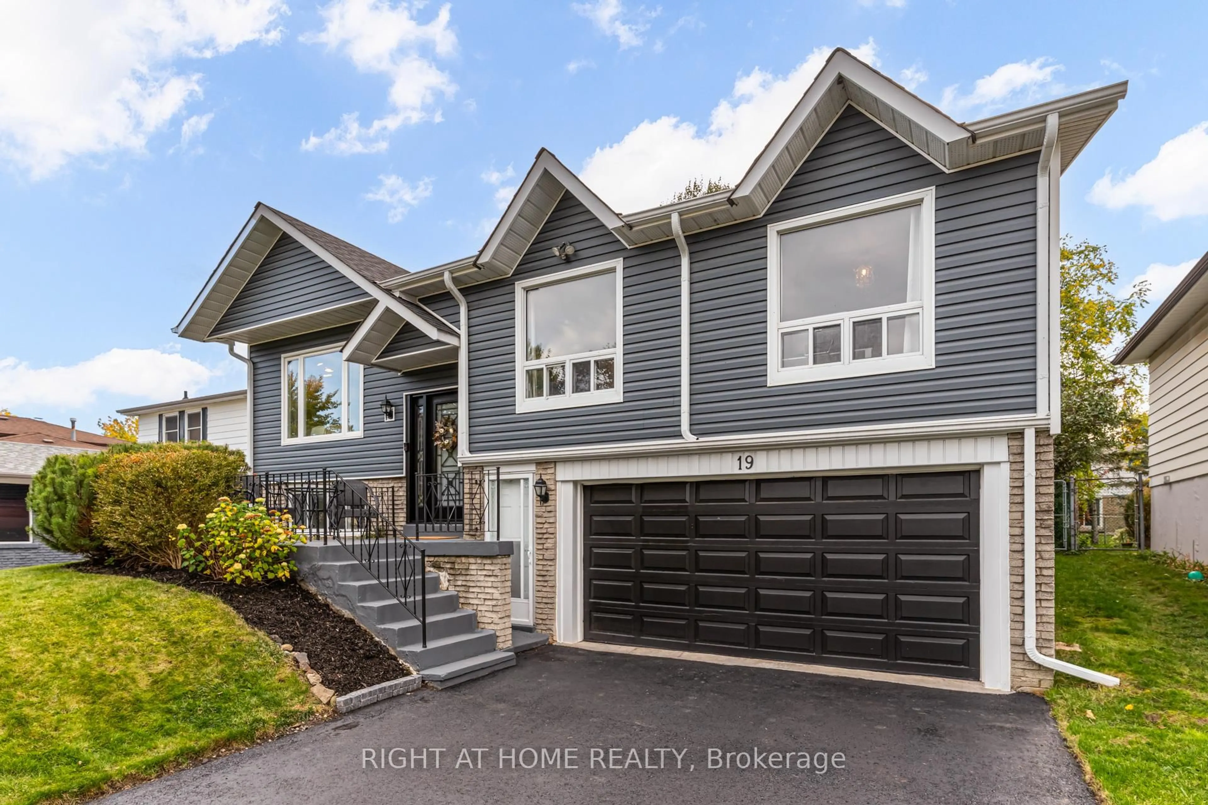 Home with vinyl exterior material, street for 19 Jefferson Rd, Brampton Ontario L6S 2G6