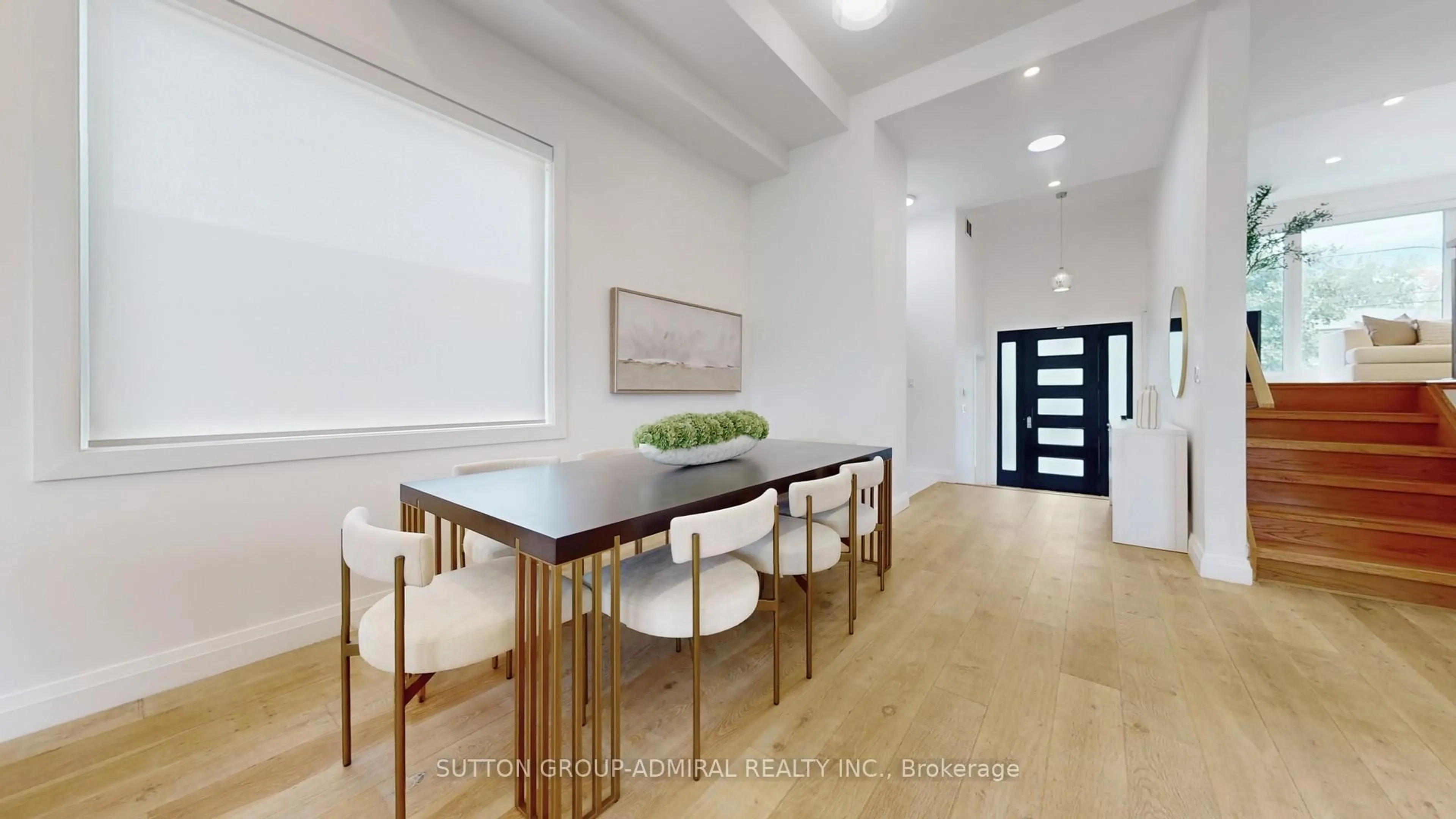 Dining room, wood/laminate floor for 13 Elder Ave, Toronto Ontario M8V 2J4