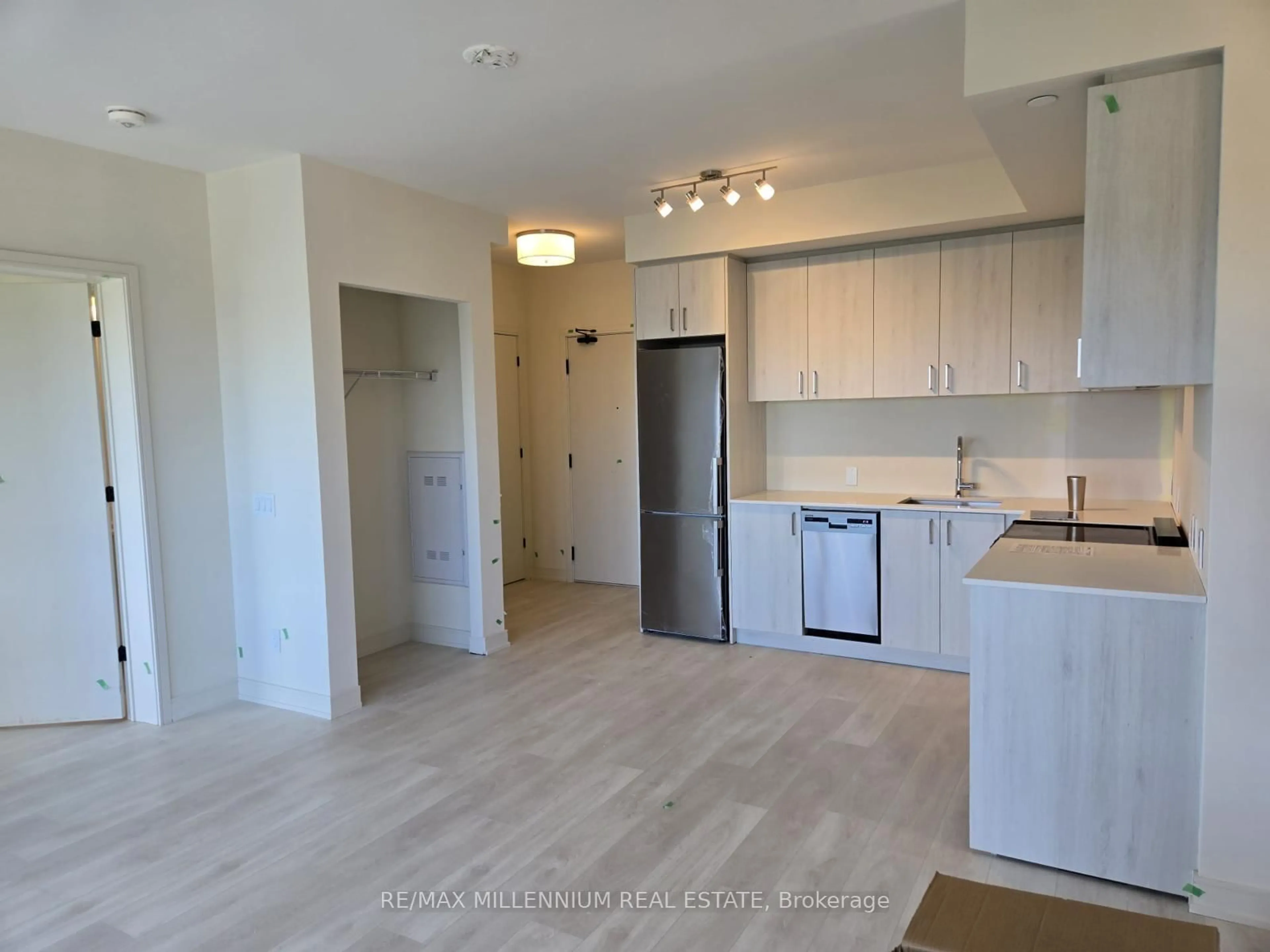 Open concept kitchen, wood/laminate floor for 8010 Derry Rd #1806, Milton Ontario L9T 9N3