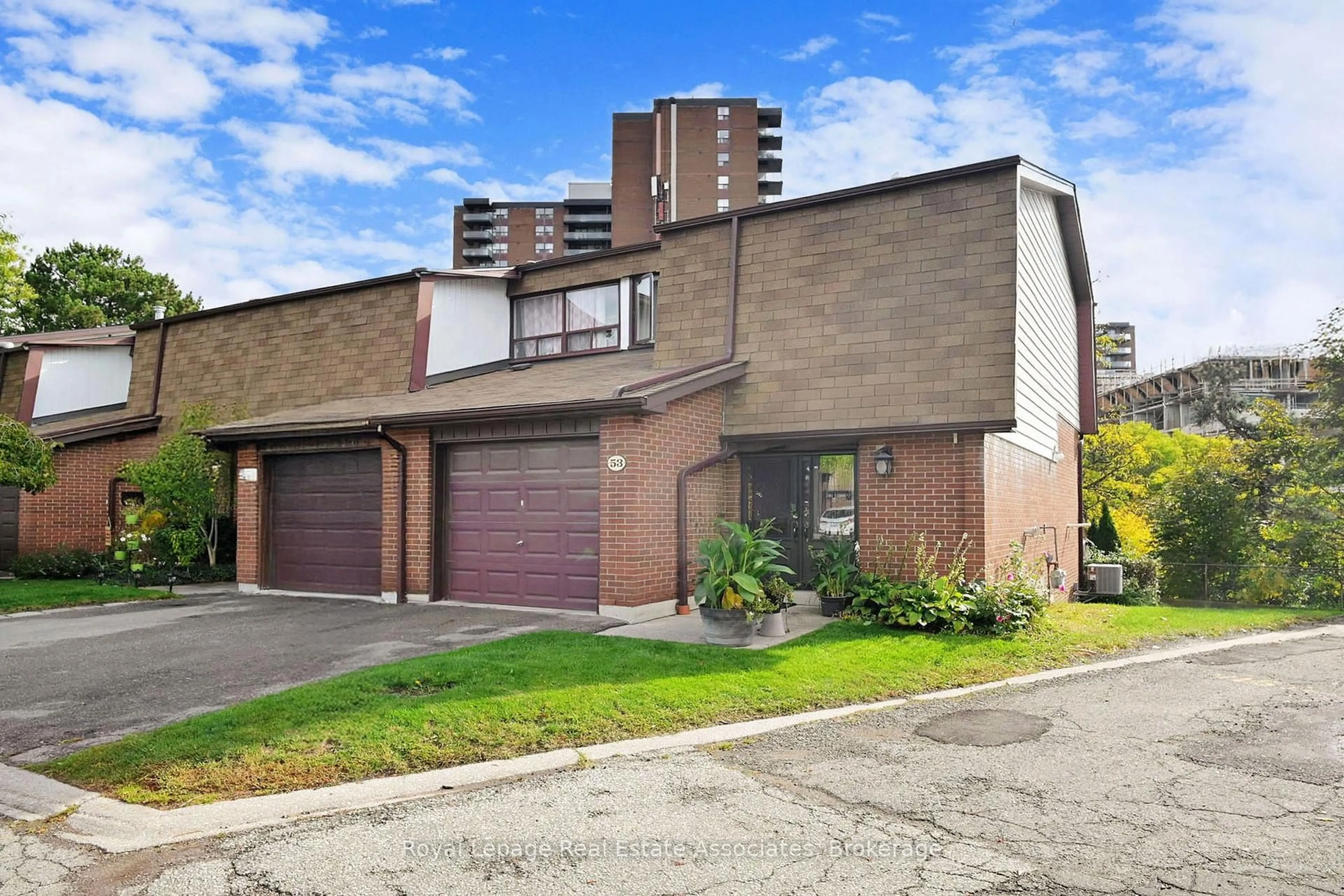 Home with brick exterior material, street for 600 Silver Creek Blvd #53, Mississauga Ontario L5A 2B4
