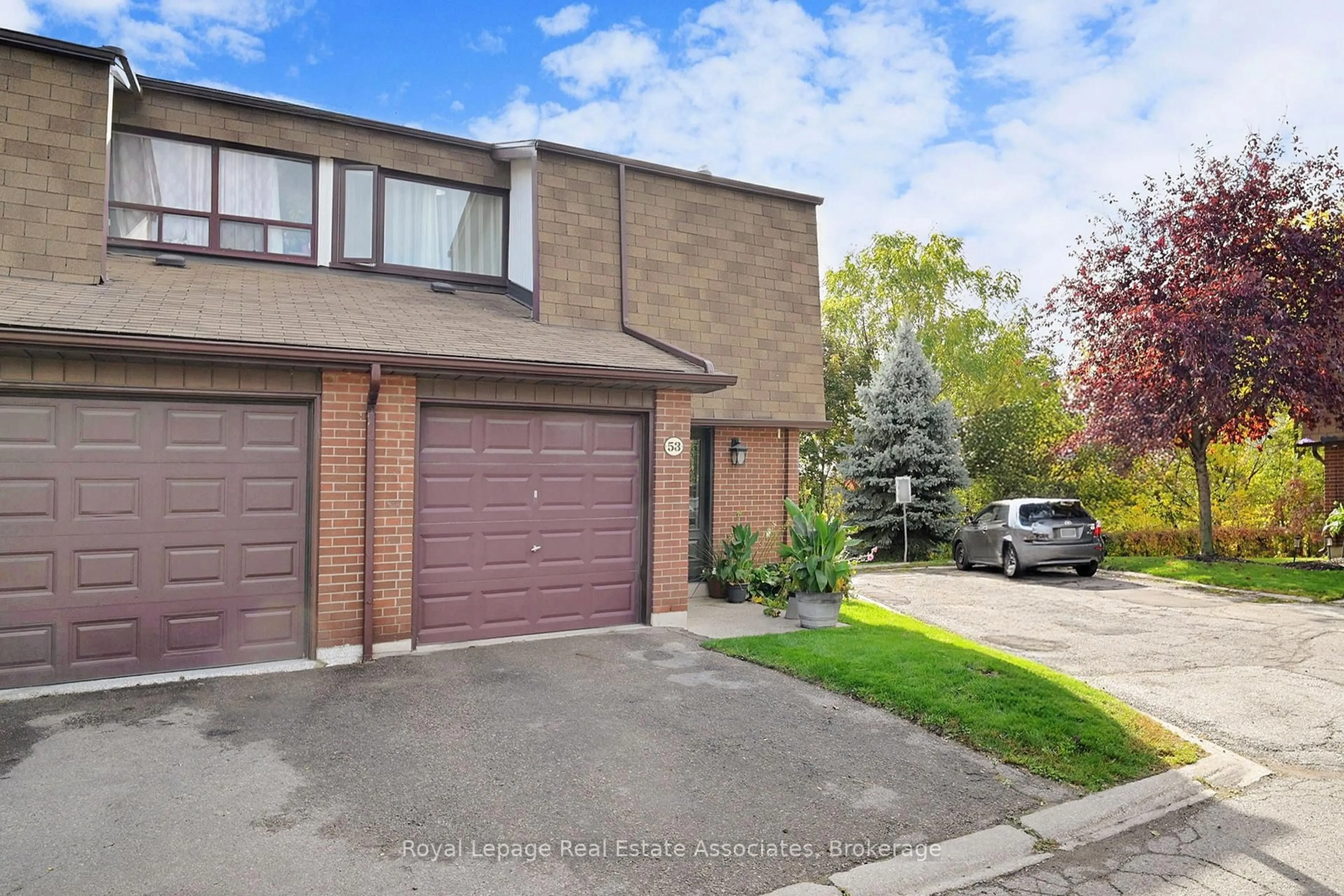 Home with brick exterior material, street for 600 Silver Creek Blvd #53, Mississauga Ontario L5A 2B4
