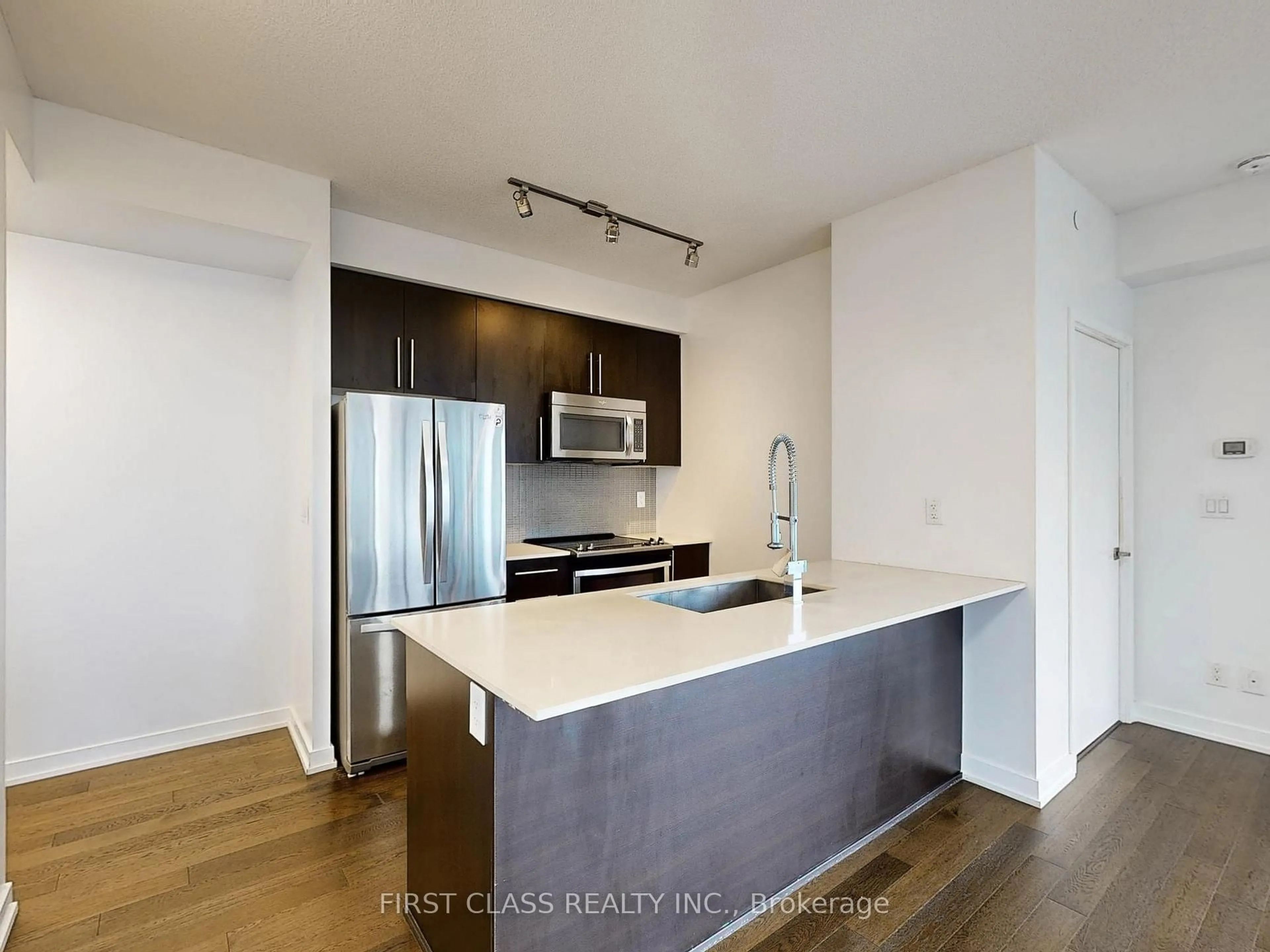 Open concept kitchen, unknown for 4011 Brickstone Mews #1802, Mississauga Ontario L5B 0J7