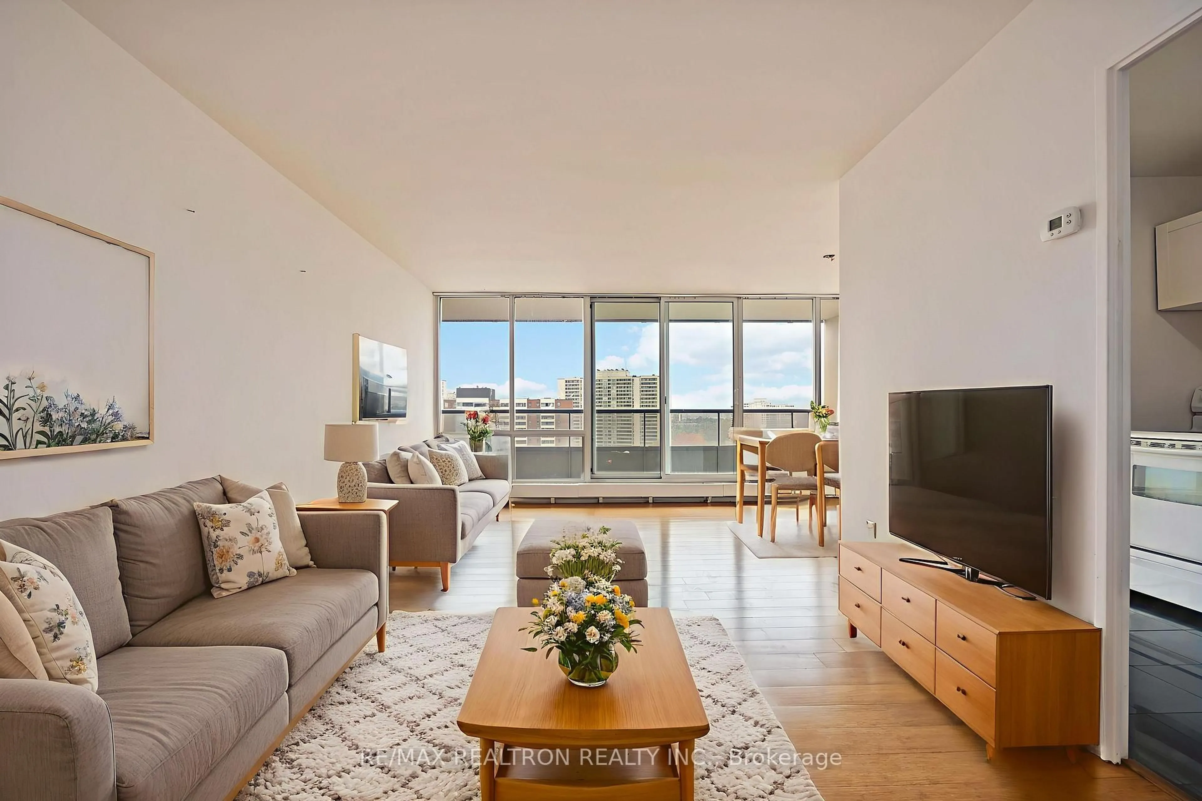 Living room with furniture, unknown for 31 Four Winds Dr #1014, Toronto Ontario M3J 1K9
