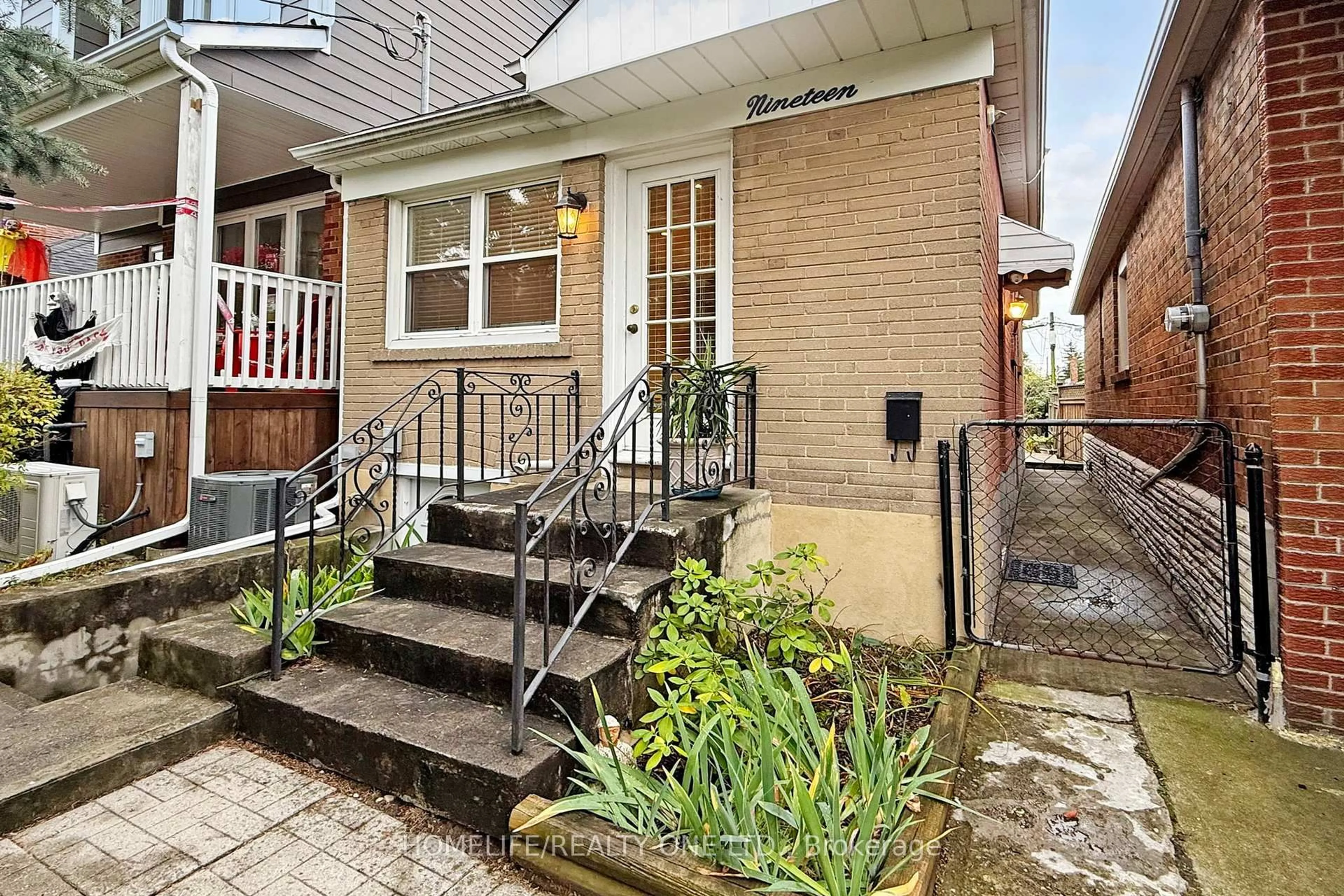 Home with brick exterior material, street for 19 Morland Rd, Toronto Ontario M6S 2M7