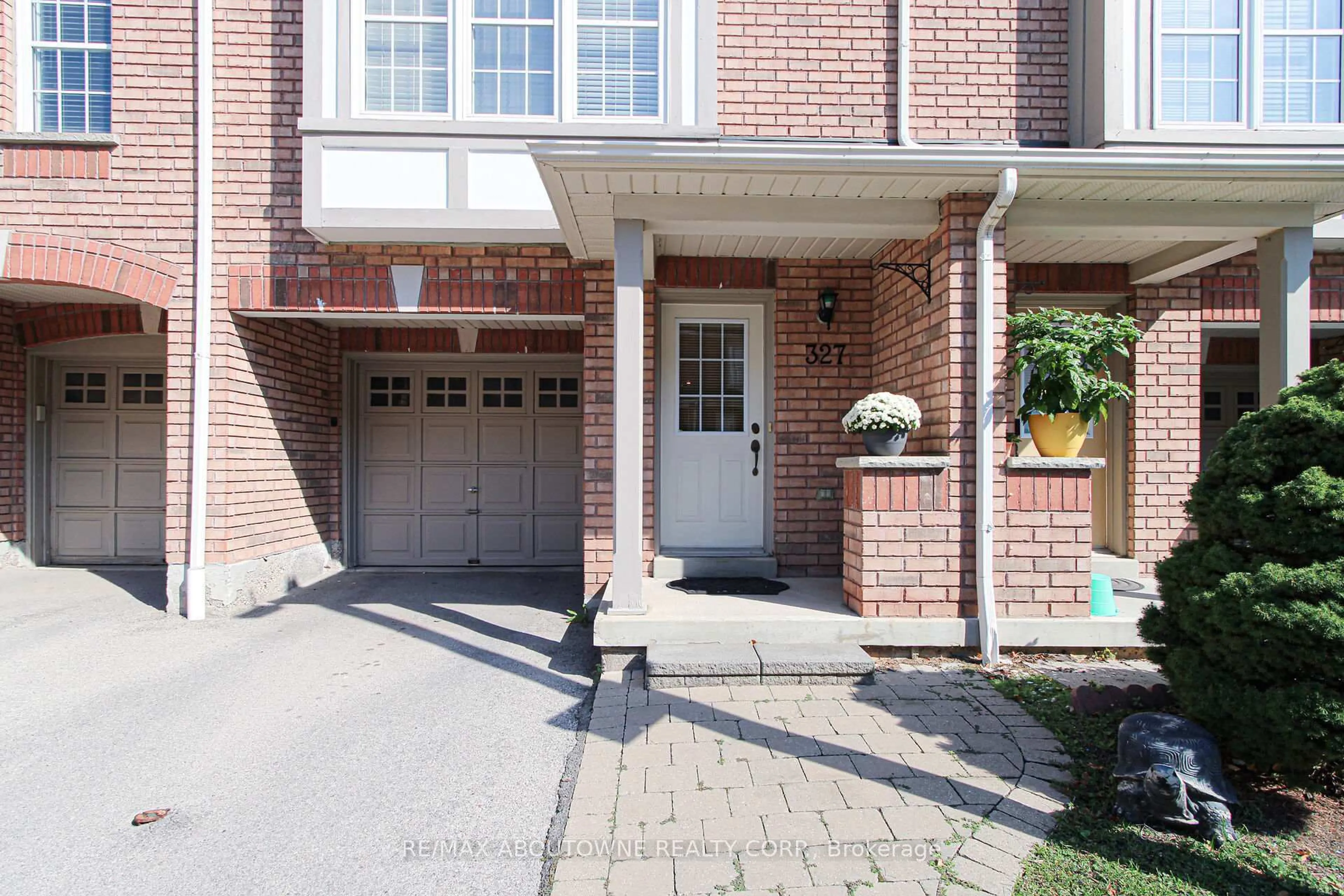Home with brick exterior material, street for 3030 Breakwater Crt #327, Mississauga Ontario L5B 4N7