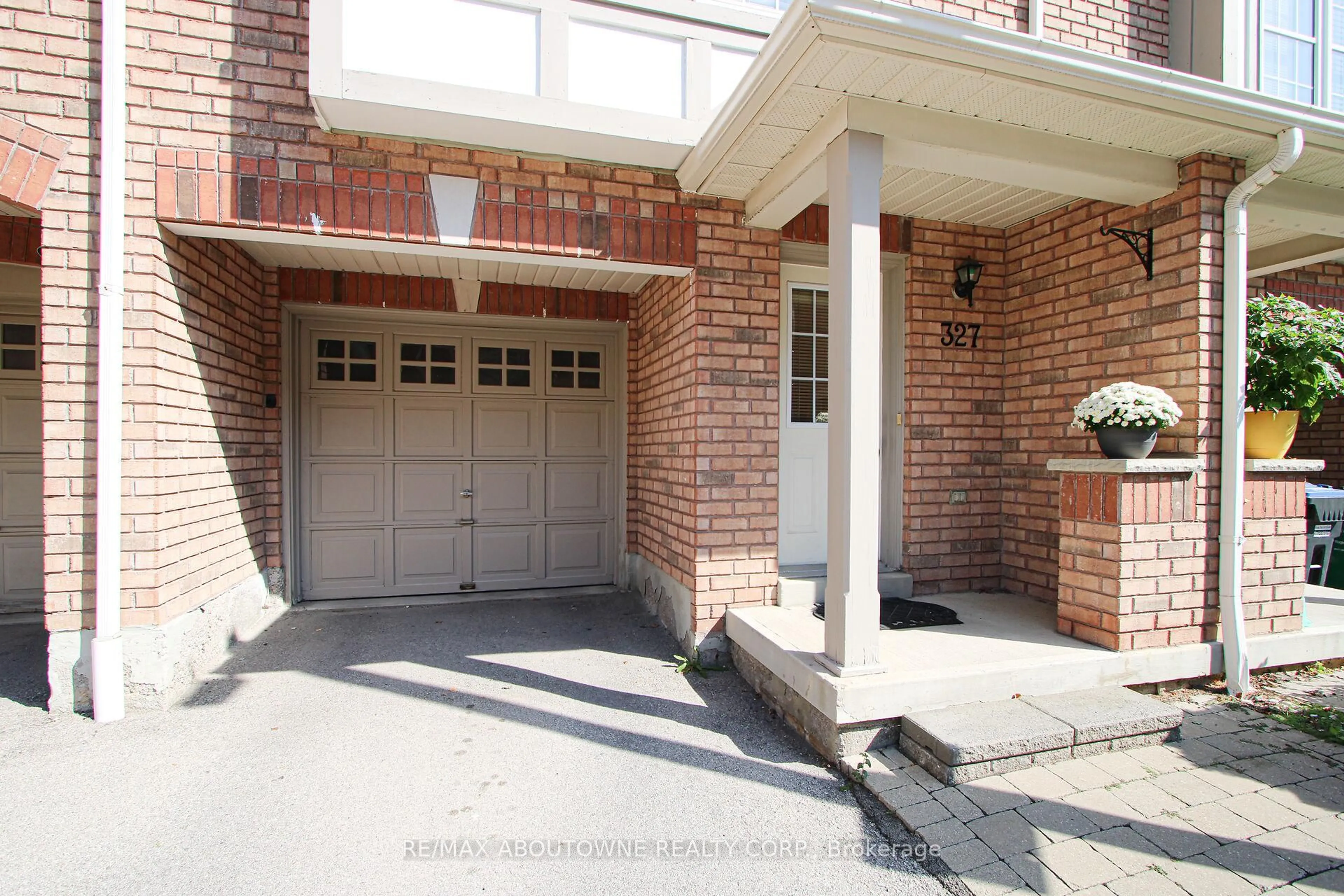 Home with brick exterior material, street for 3030 Breakwater Crt #327, Mississauga Ontario L5B 4N7