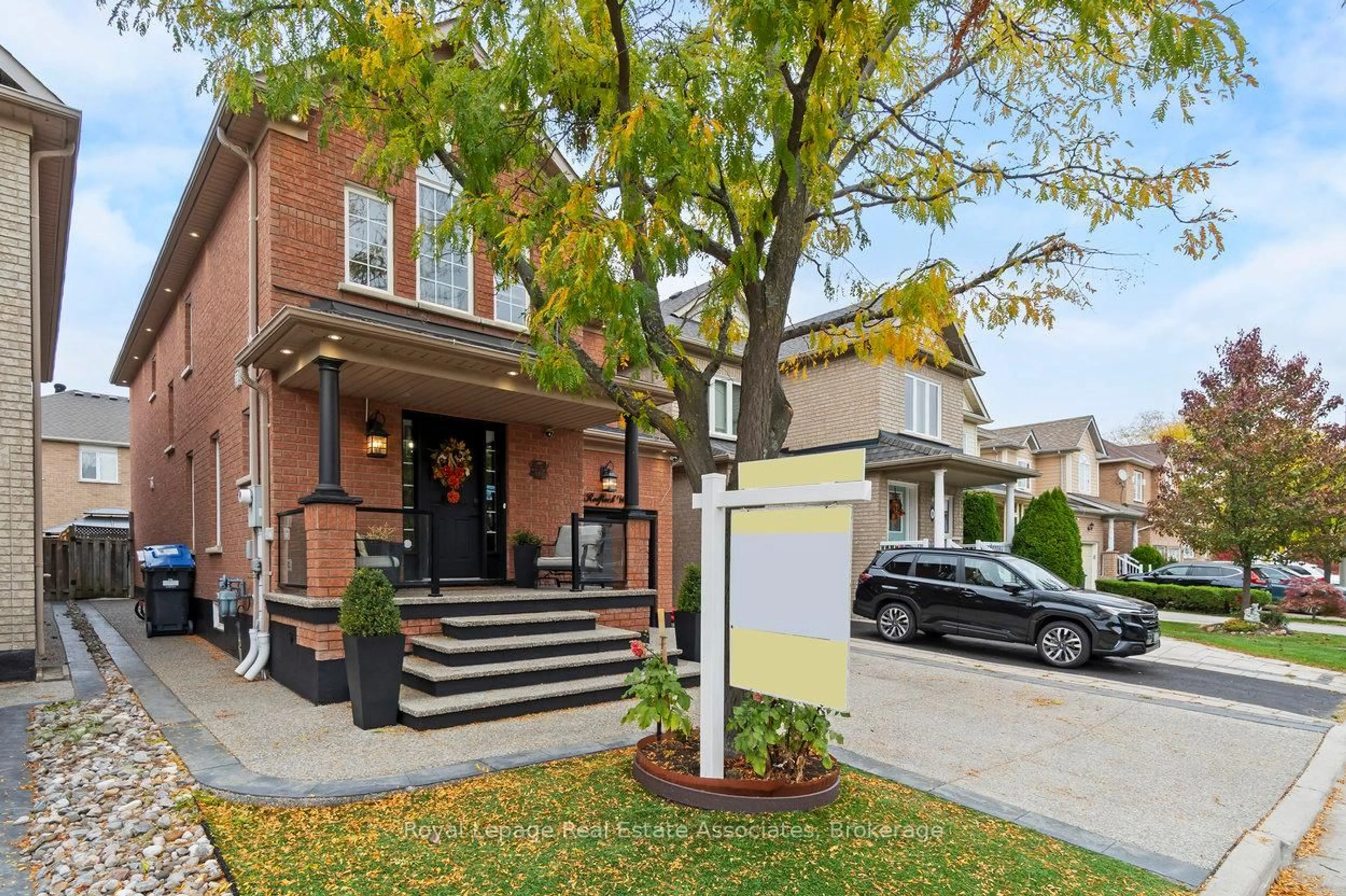 Home with brick exterior material, street for 11 Redfinch Way, Brampton Ontario L7A 2B2