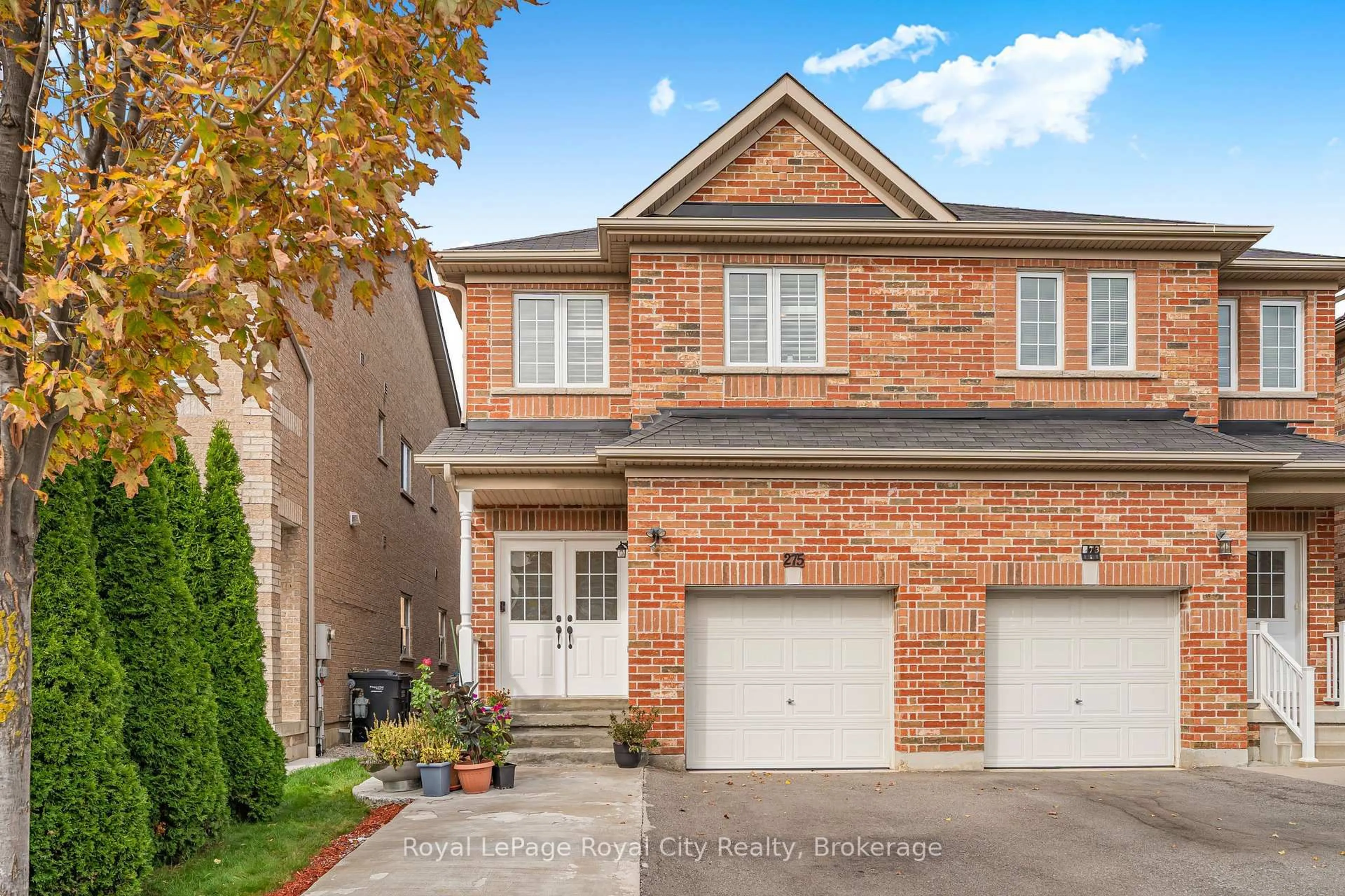 Home with brick exterior material, street for 275 Comiskey Cres, Mississauga Ontario L5W 0C4