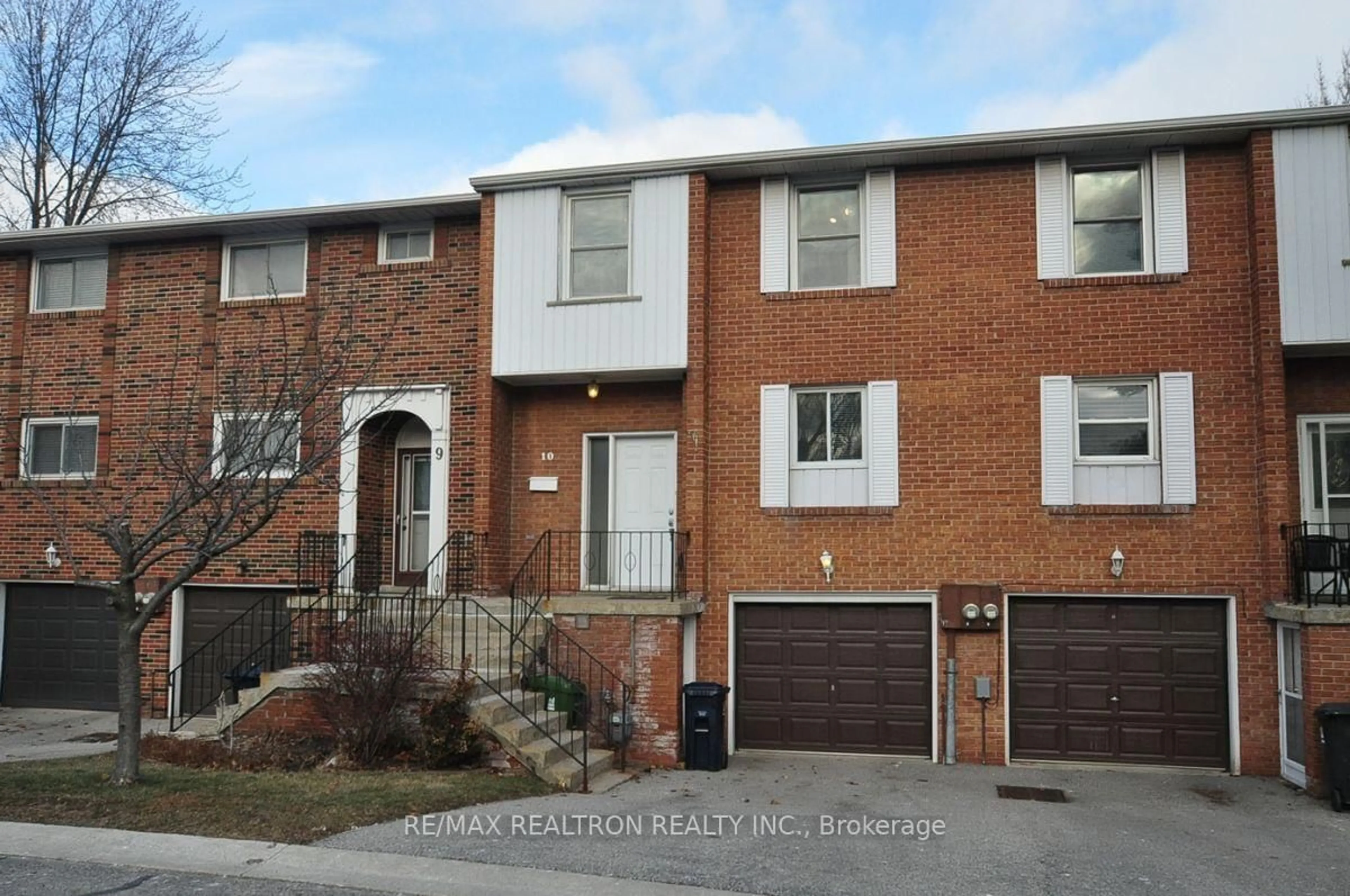 Home with brick exterior material, street for 19 Centennial Park Rd #10, Toronto Ontario M9C 4W8
