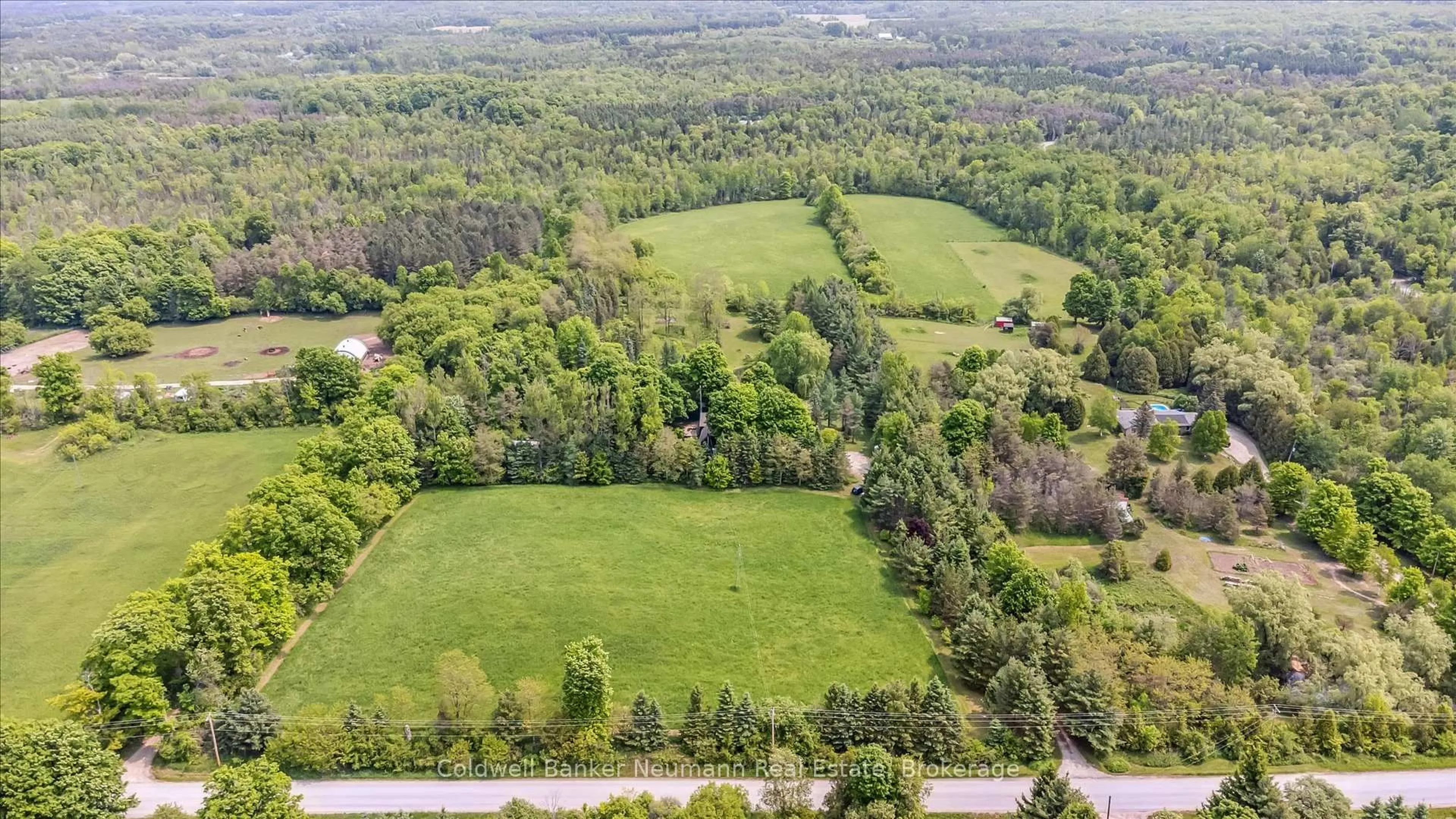 A pic from outside/outdoor area/front of a property/back of a property/a pic from drone, forest/trees view for 13085 Nassagaweya Puslinch Townline, Milton Ontario L0P 1J0