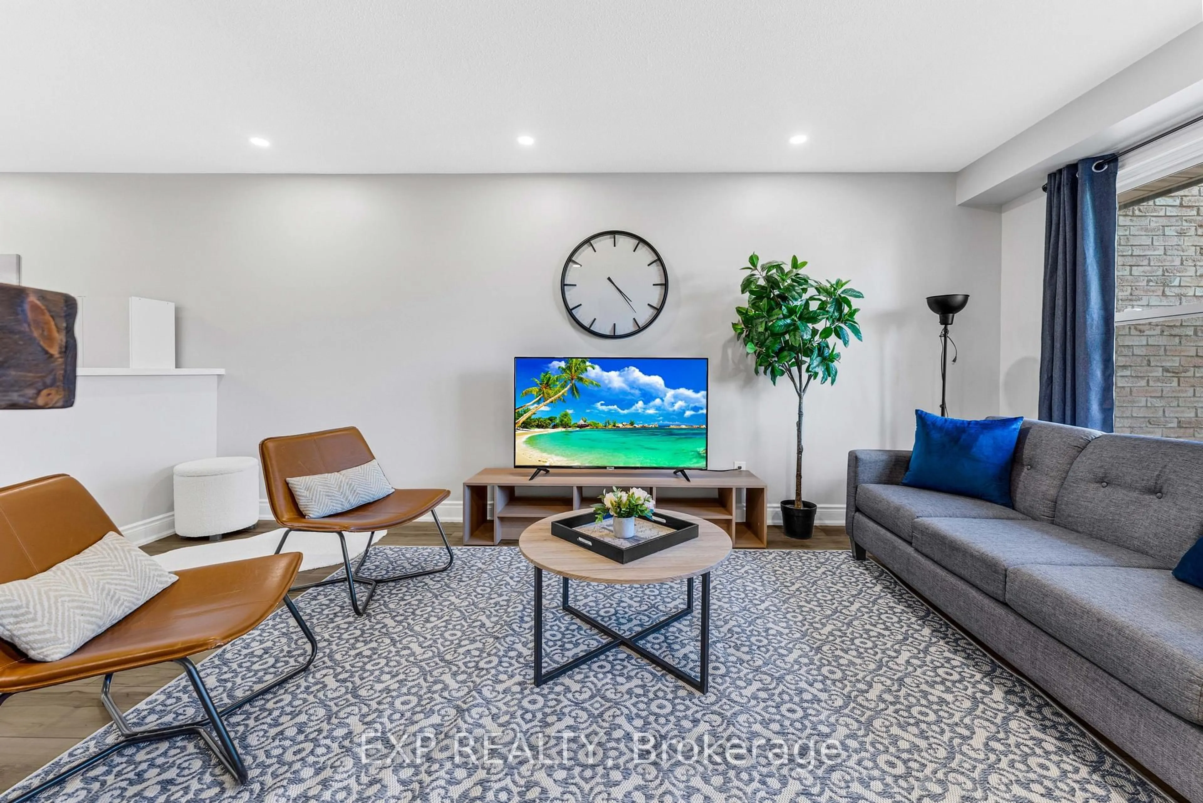 Living room with furniture, ceramic/tile floor for 2258 Manchester Dr, Burlington Ontario L7P 3W2