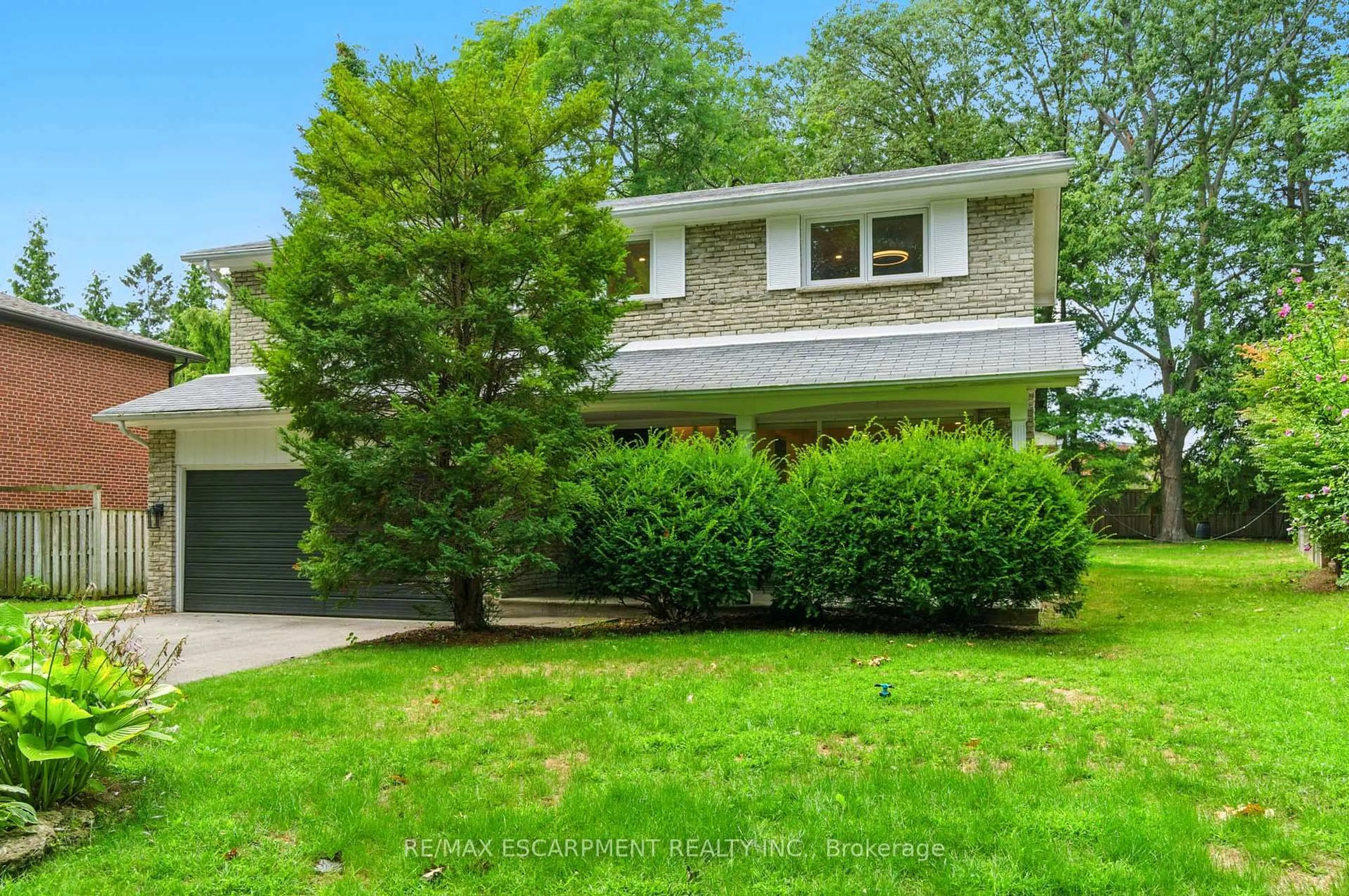 Home with vinyl exterior material, street for 1245 Bramblewood Lane, Mississauga Ontario L5H 1L9