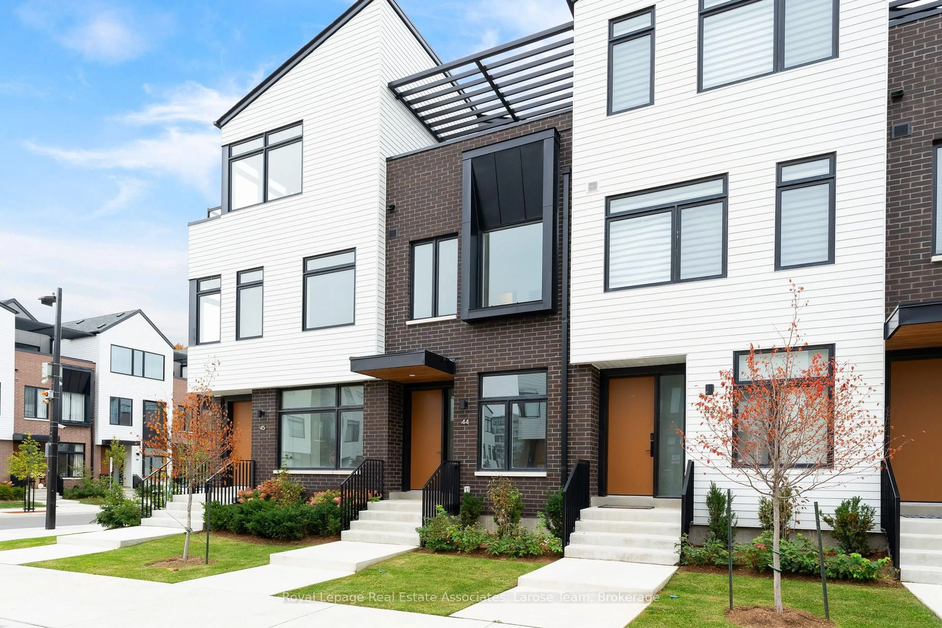 Home with brick exterior material, street for 30 Lou Parsons Way #44, Mississauga Ontario L5H 0B2