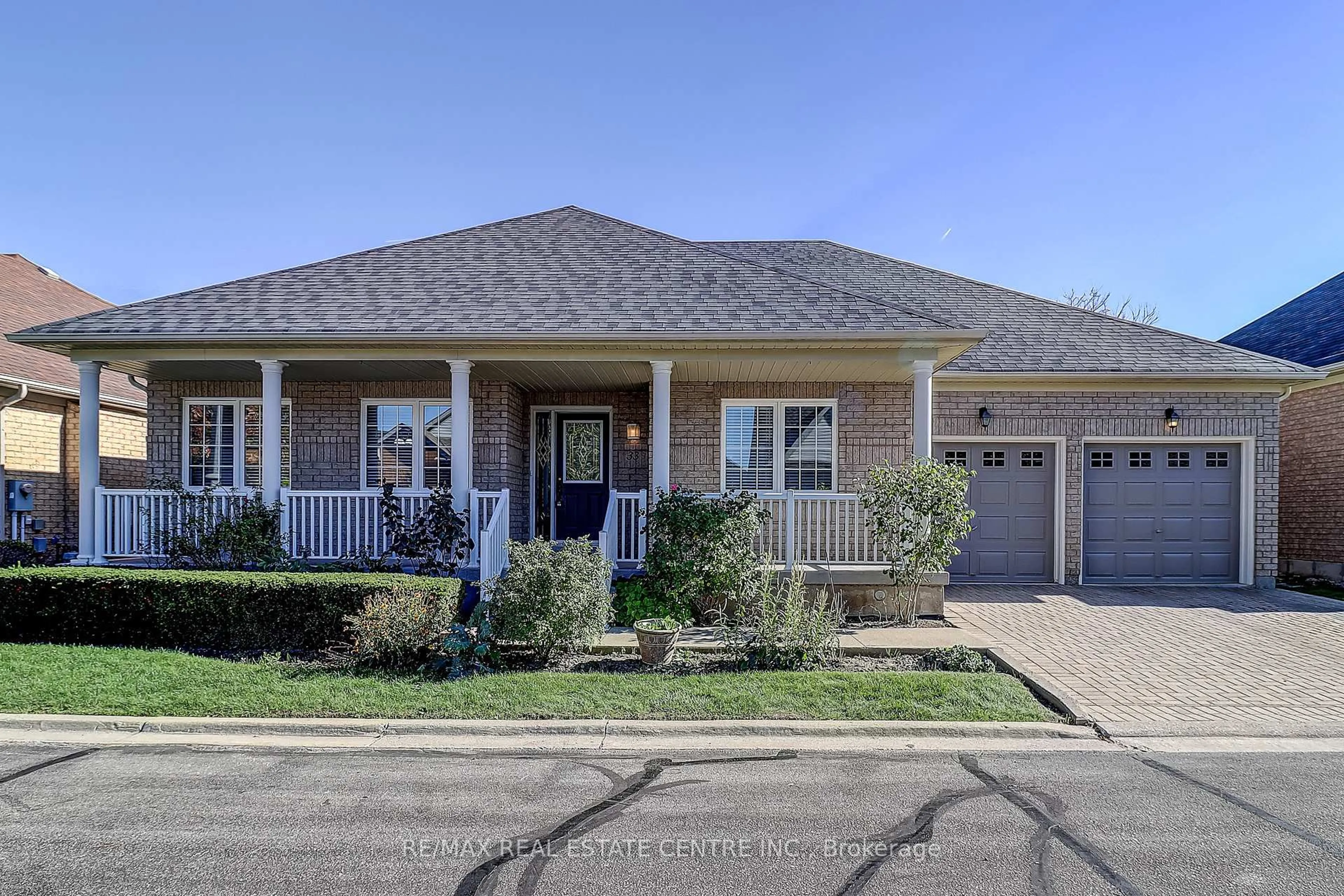 Home with brick exterior material, street for 33 Calliandra Tr, Brampton Ontario L6R 0S3