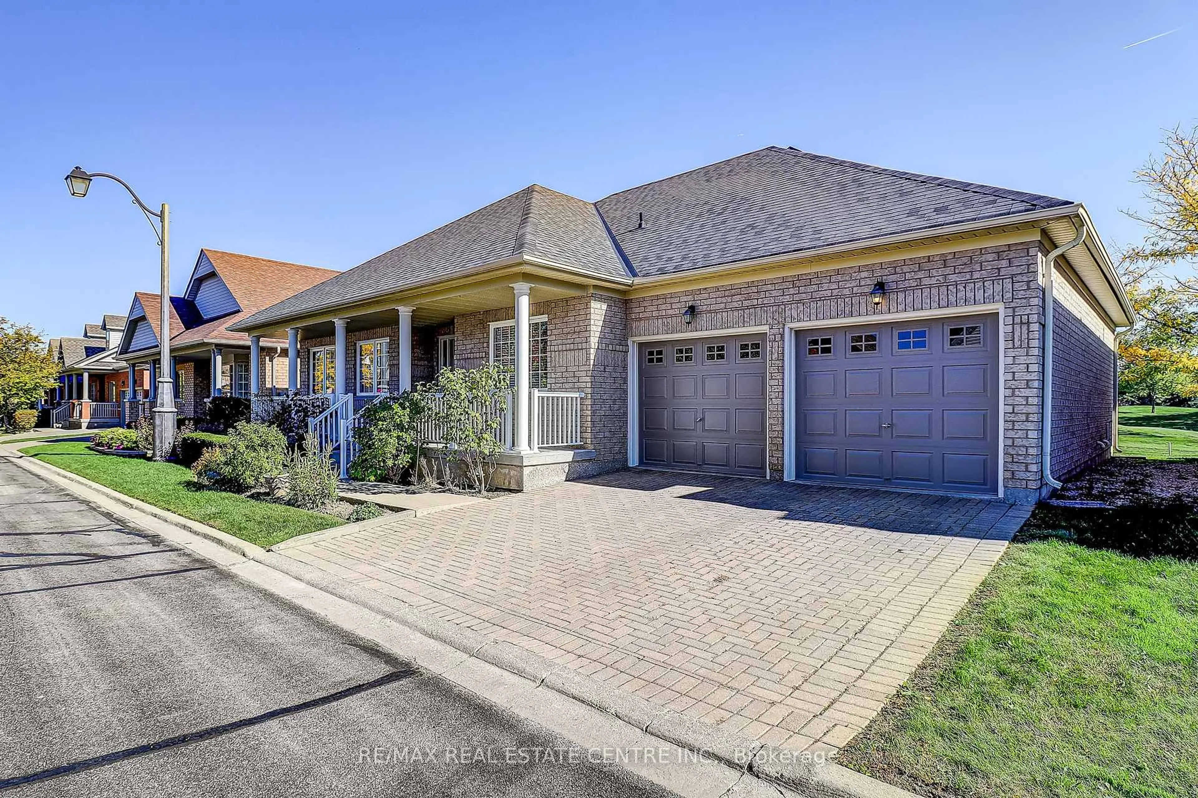 Home with brick exterior material, street for 33 Calliandra Tr, Brampton Ontario L6R 0S3