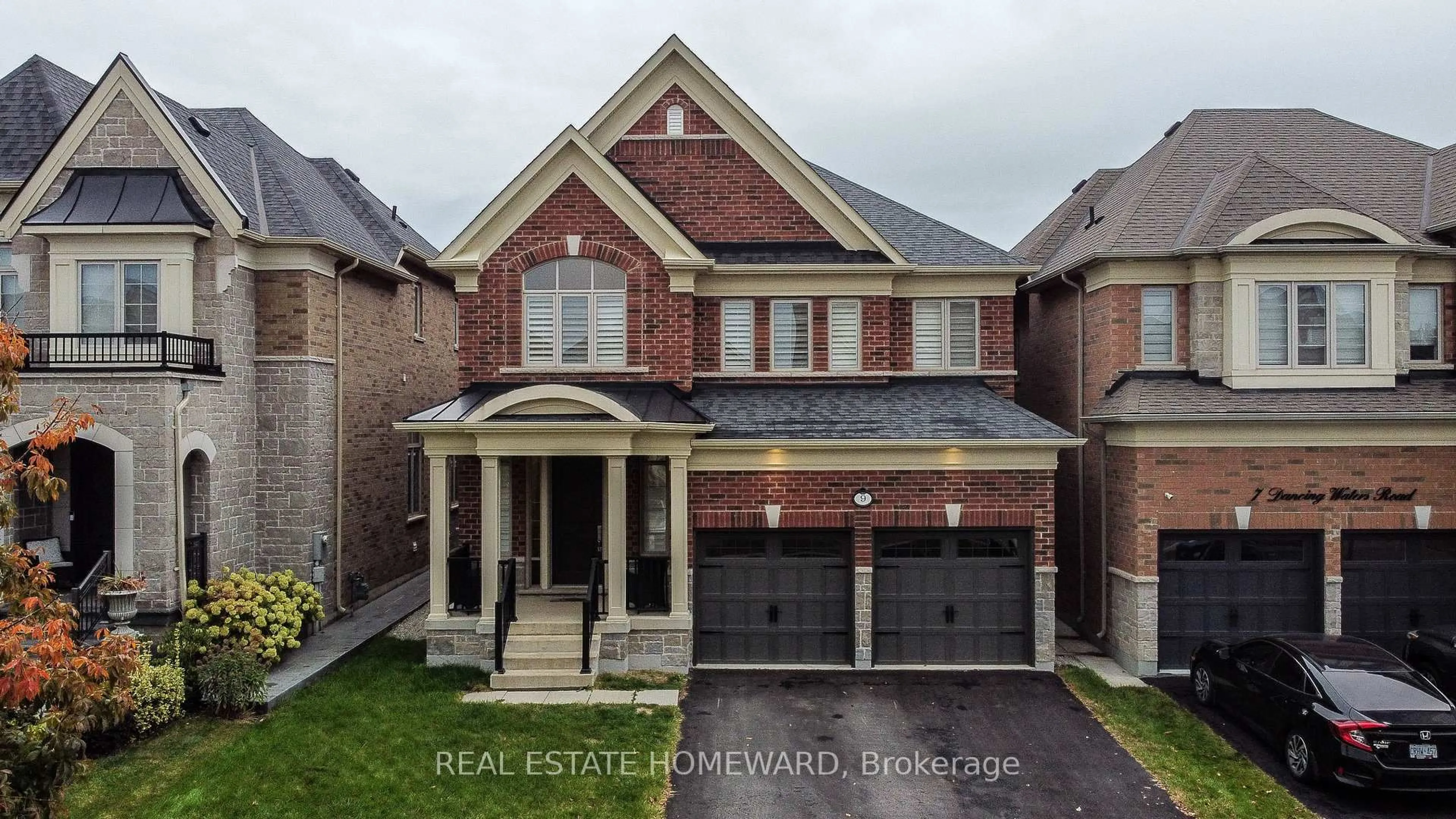 Home with brick exterior material, street for 9 Dancing Waters Rd, Brampton Ontario L6Y 6B5