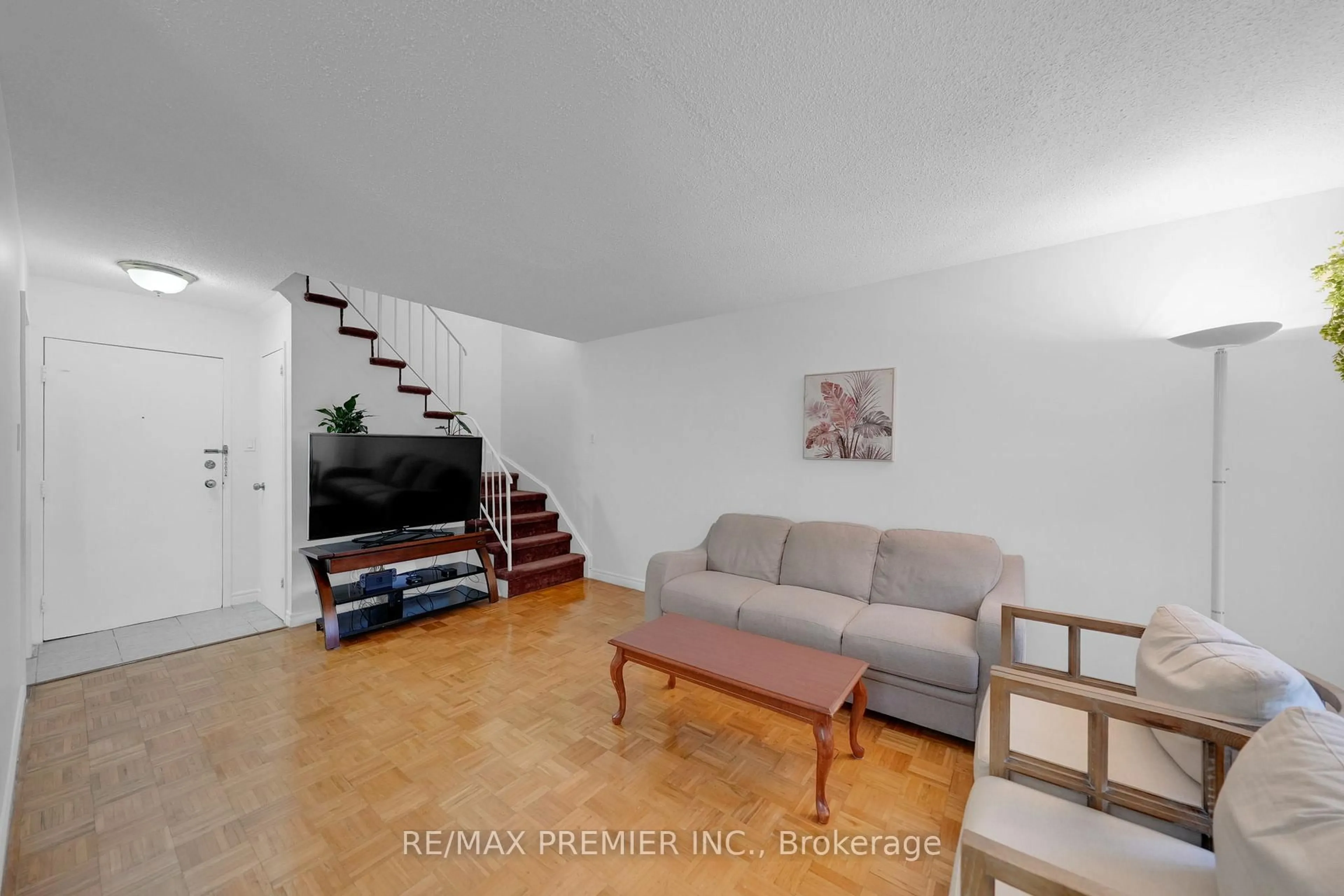 Living room with furniture, floor is not visible for 2095 Roche Crt #209, Mississauga Ontario L5K 2C8